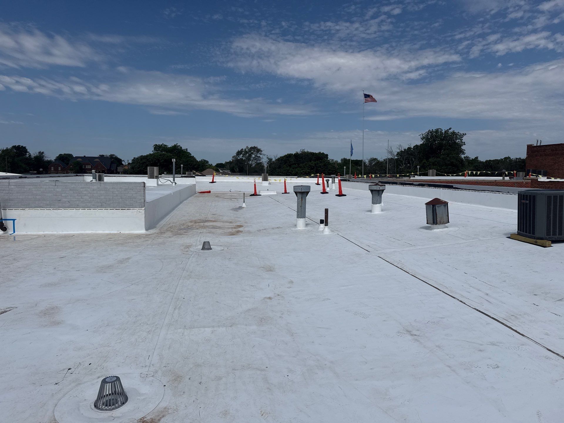 Hollis High School Comprehensive TPO Roof Replacement and Restoration by Secondary Rhodes