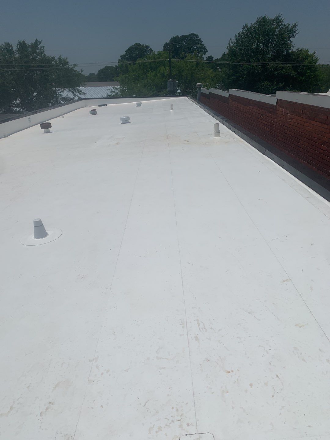 Commercial Roofing Installation using 50 mil PVC by Hostetler Roofing