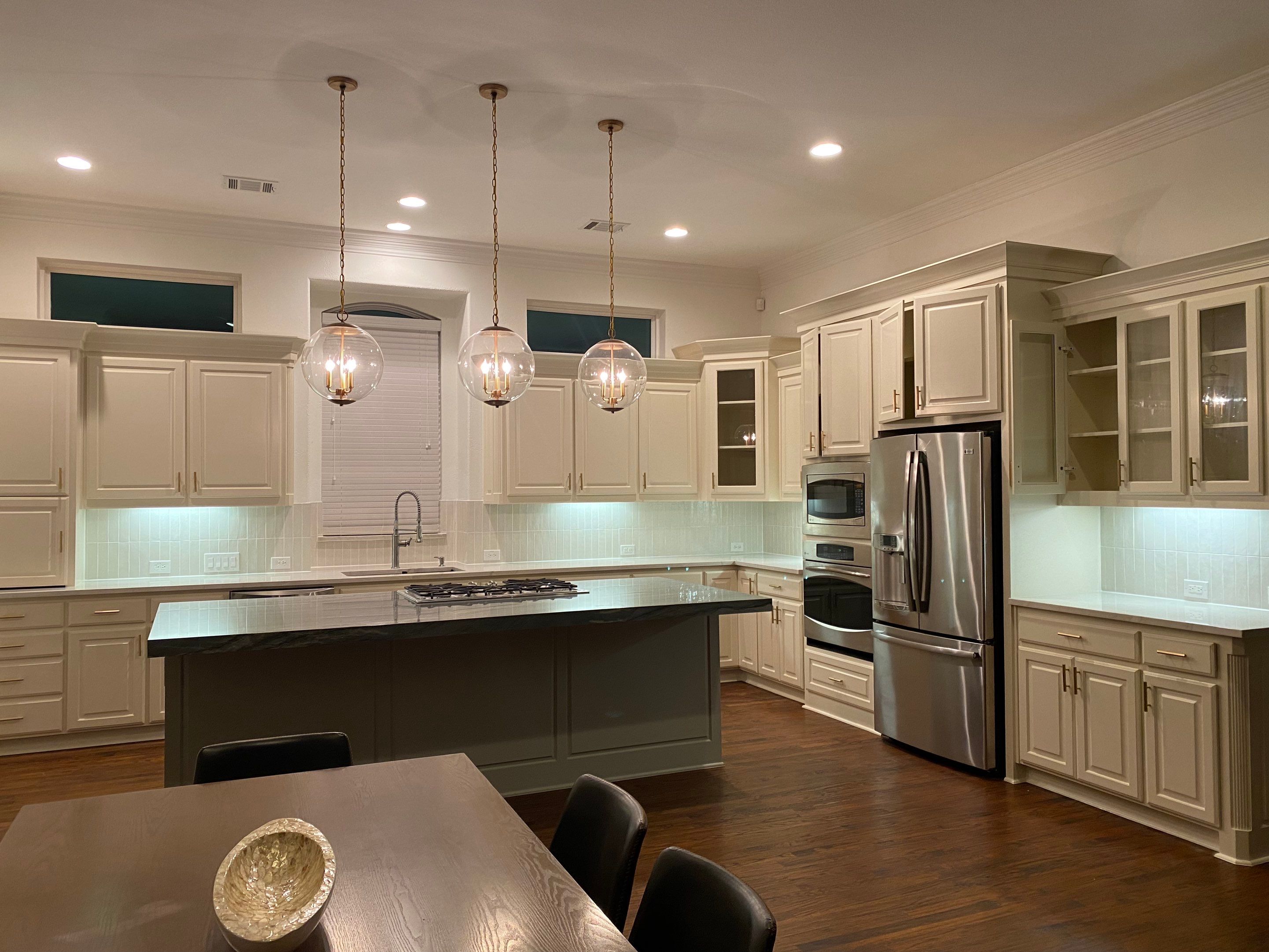 Kitchen Remodel using Quartzite by SLM General Contractors & Roofing