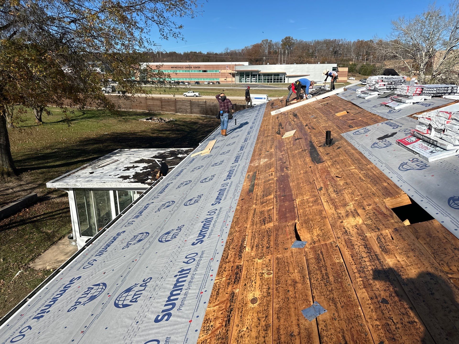 Residential Roofing & Downspouts Install  by Titan Commercial & Residential Roofing 