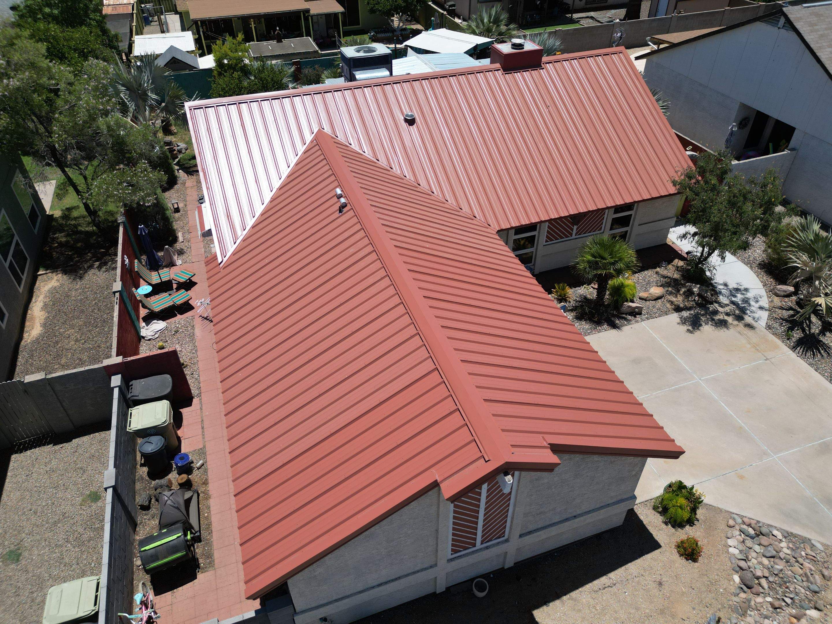 Terra Cotta Exposed Fastener by Reimagine Roofing