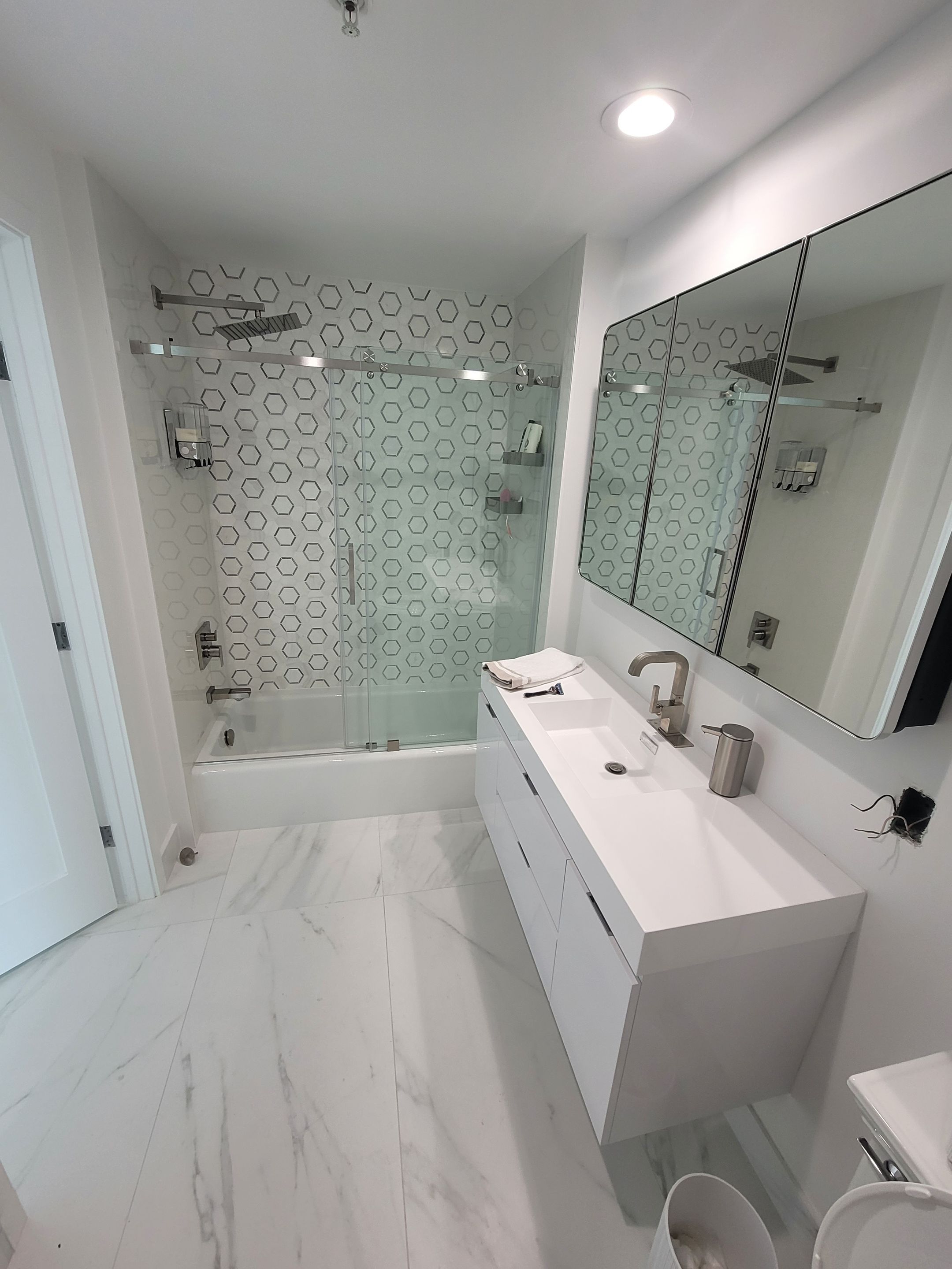 Modern High-Rise Interior Renovation and Custom Tile Installation in Miami by Picos Construction Engineering