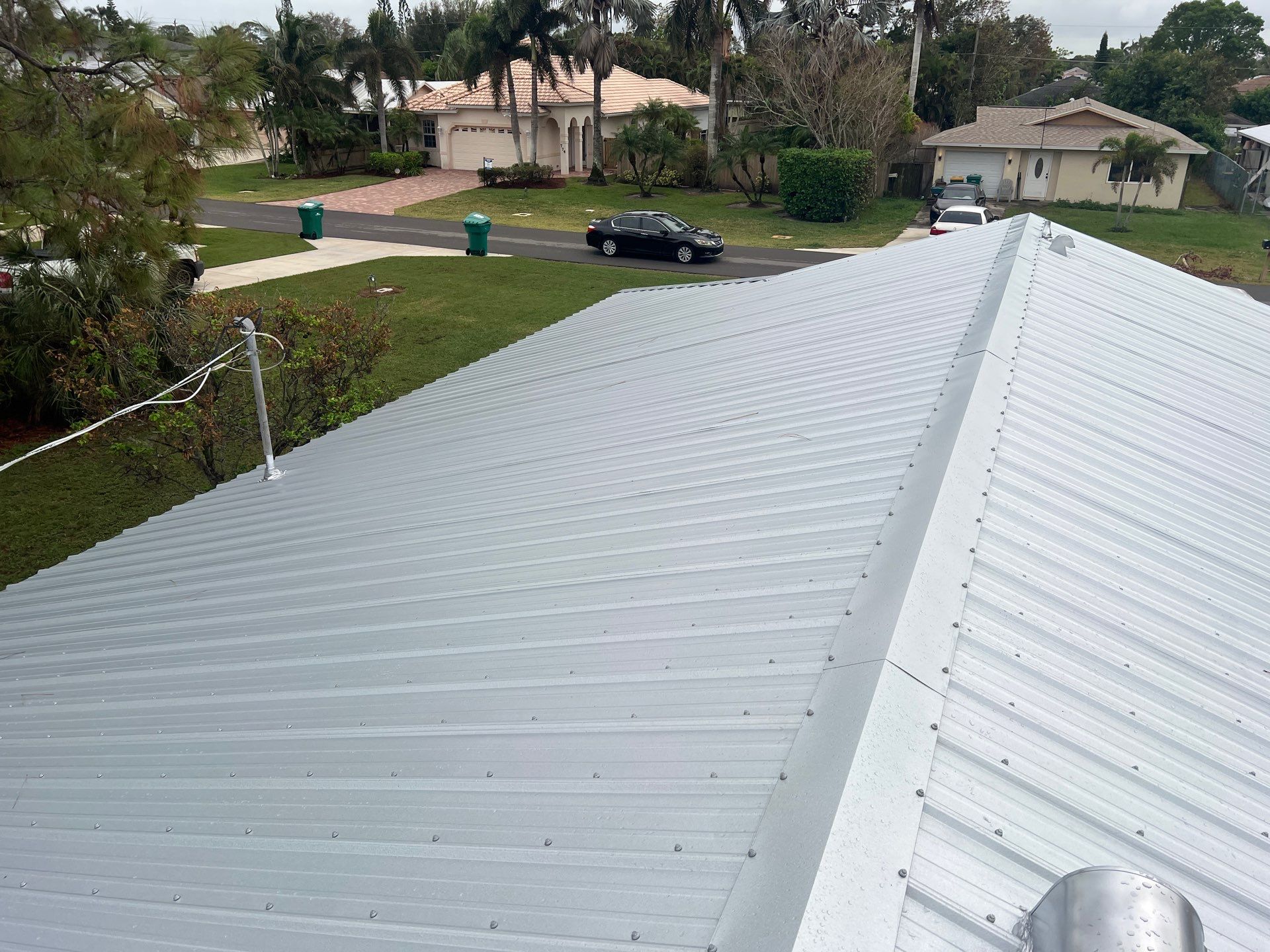 Residential Roofing Installation using Durabull Classic Rib Panel by Durabilis Roofing INC