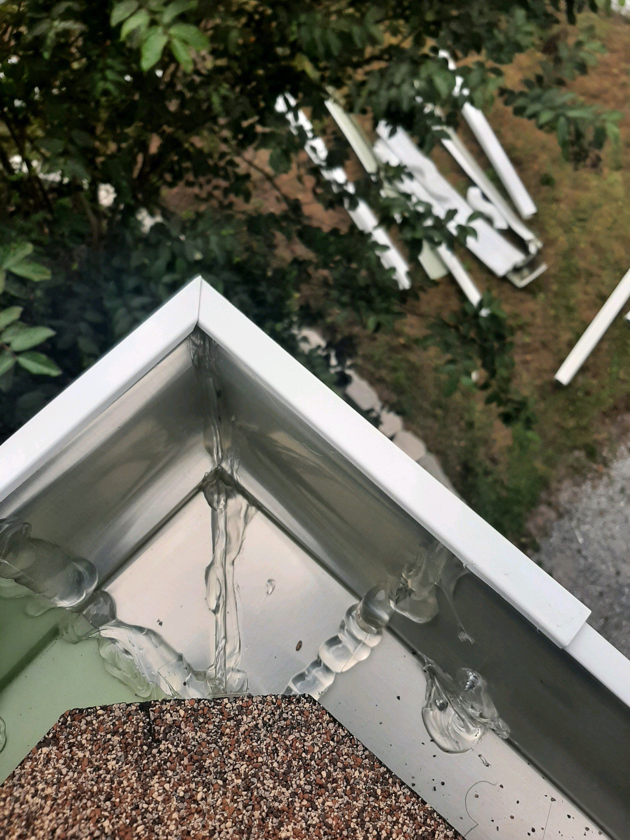 Seamless Gutter Installation using White K-Style Gutters by Gutter Professors