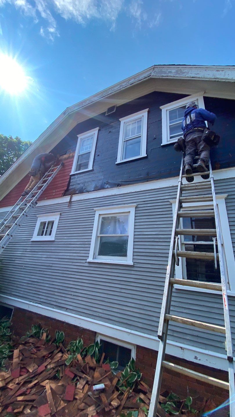 Asphalt Roof, Vinyl Siding, and Aluminum Gutter Replacement by Custom Installations