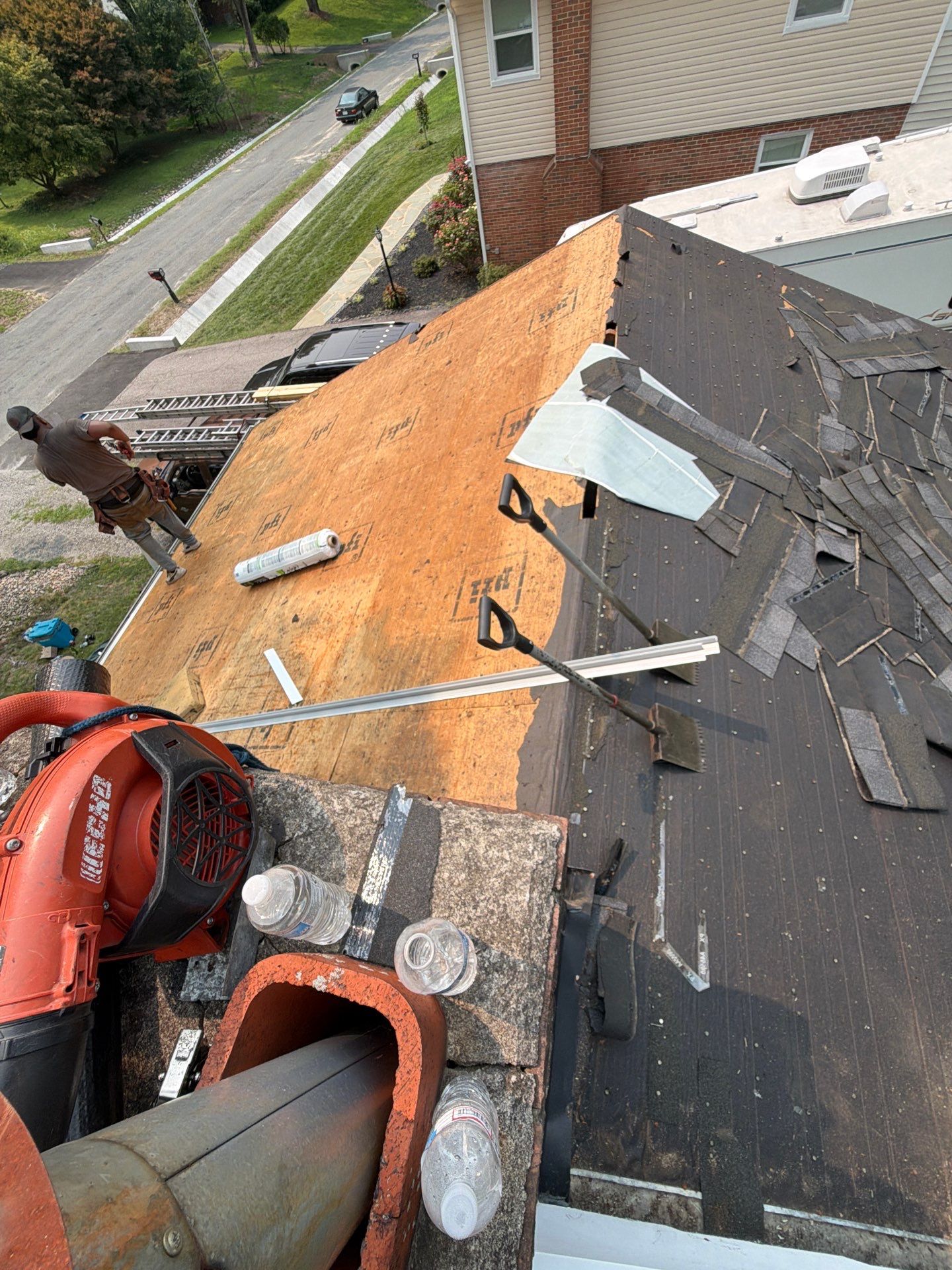 Asphalt Shingle Roof Replacement and Gutter Installation in Richmond by Cade Construction