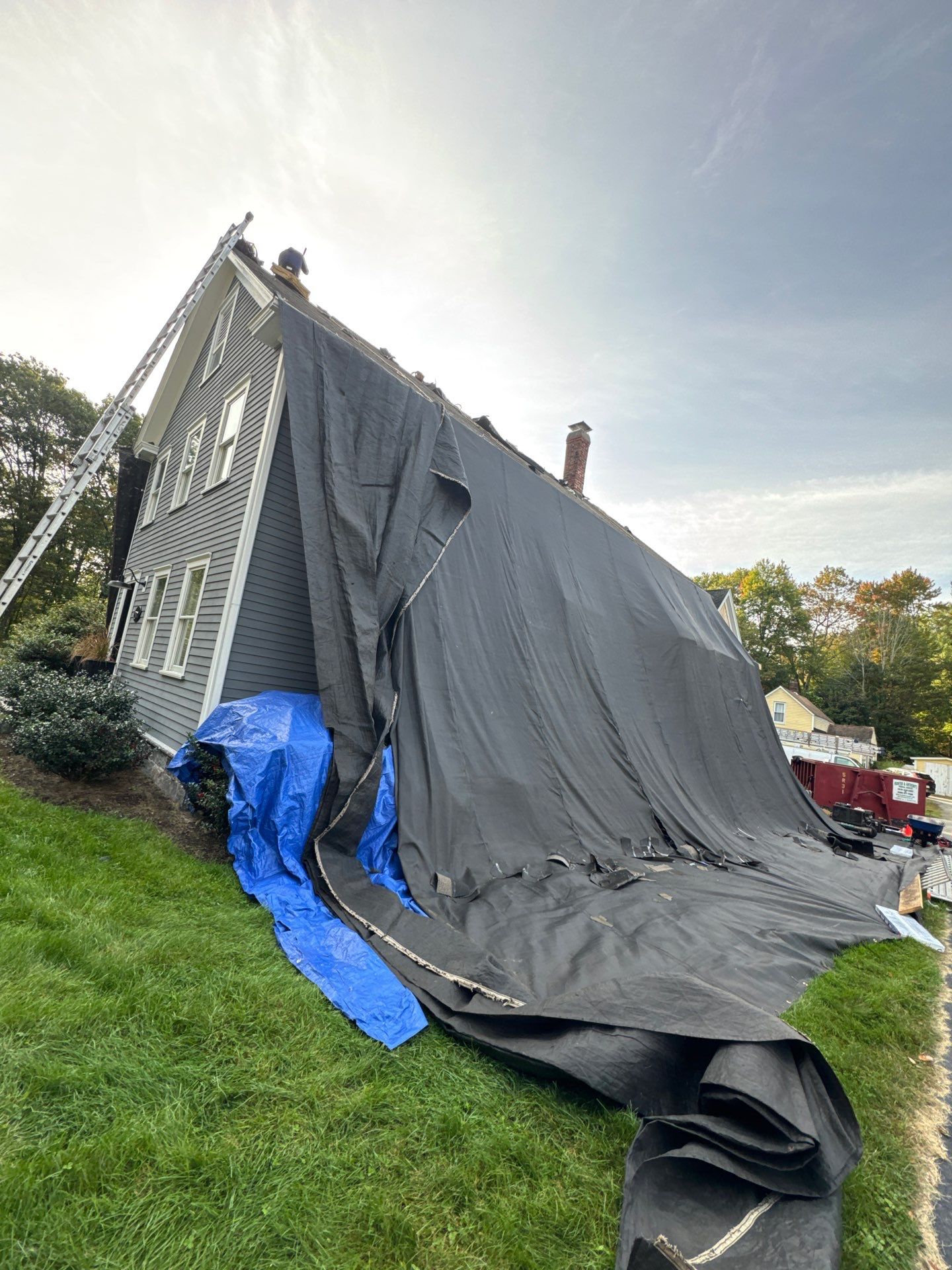 Roof Replacement & Chimney Removal – Westford, MA by Mighty Dog Roofing of Greater Middlesex County