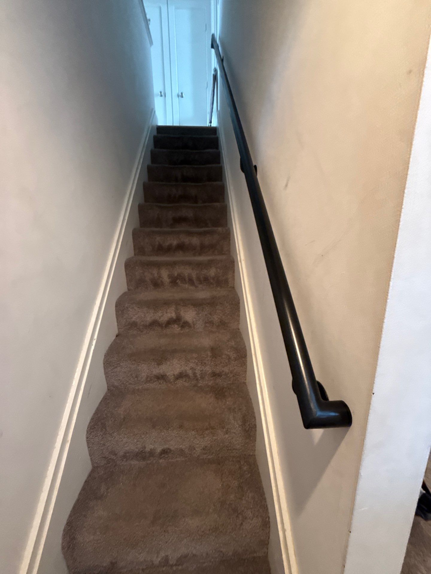 Two Black Metal Handrail Installation Across Multi-Level Washington Staircases by Capitol Iron Works