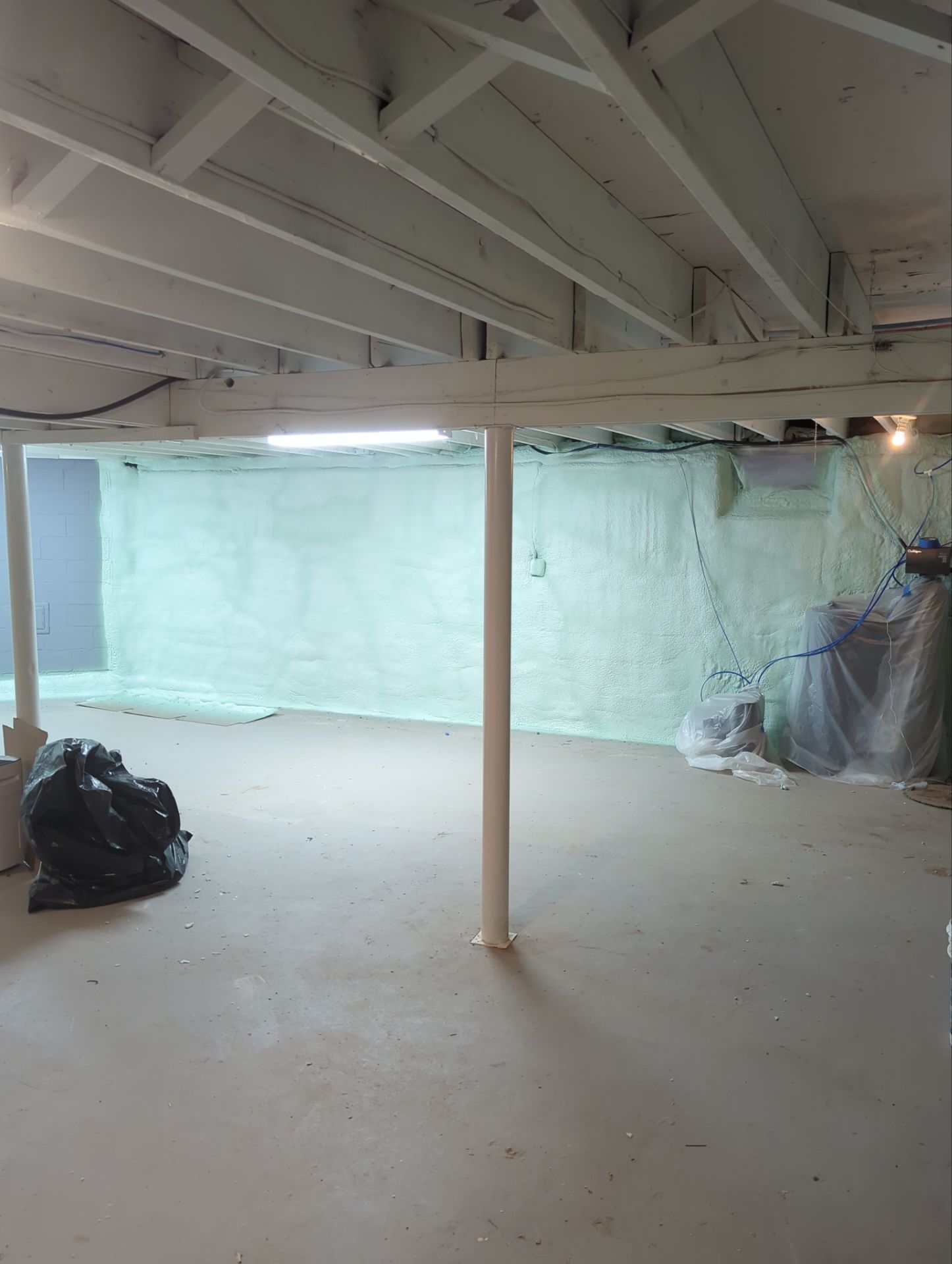 Basement Exterior Walls using Closed Cell Spray Foam by NYS Foam & Energy