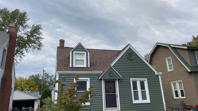 Siding Replacement using CertainTeed Restoration Classic D5 Forest Green