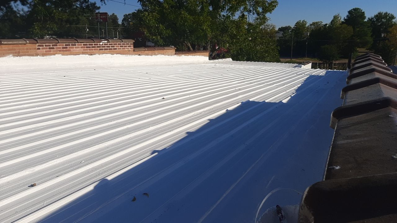 Commercial Roofing Installation using Aldocoat Coatings by Hostetler Roofing