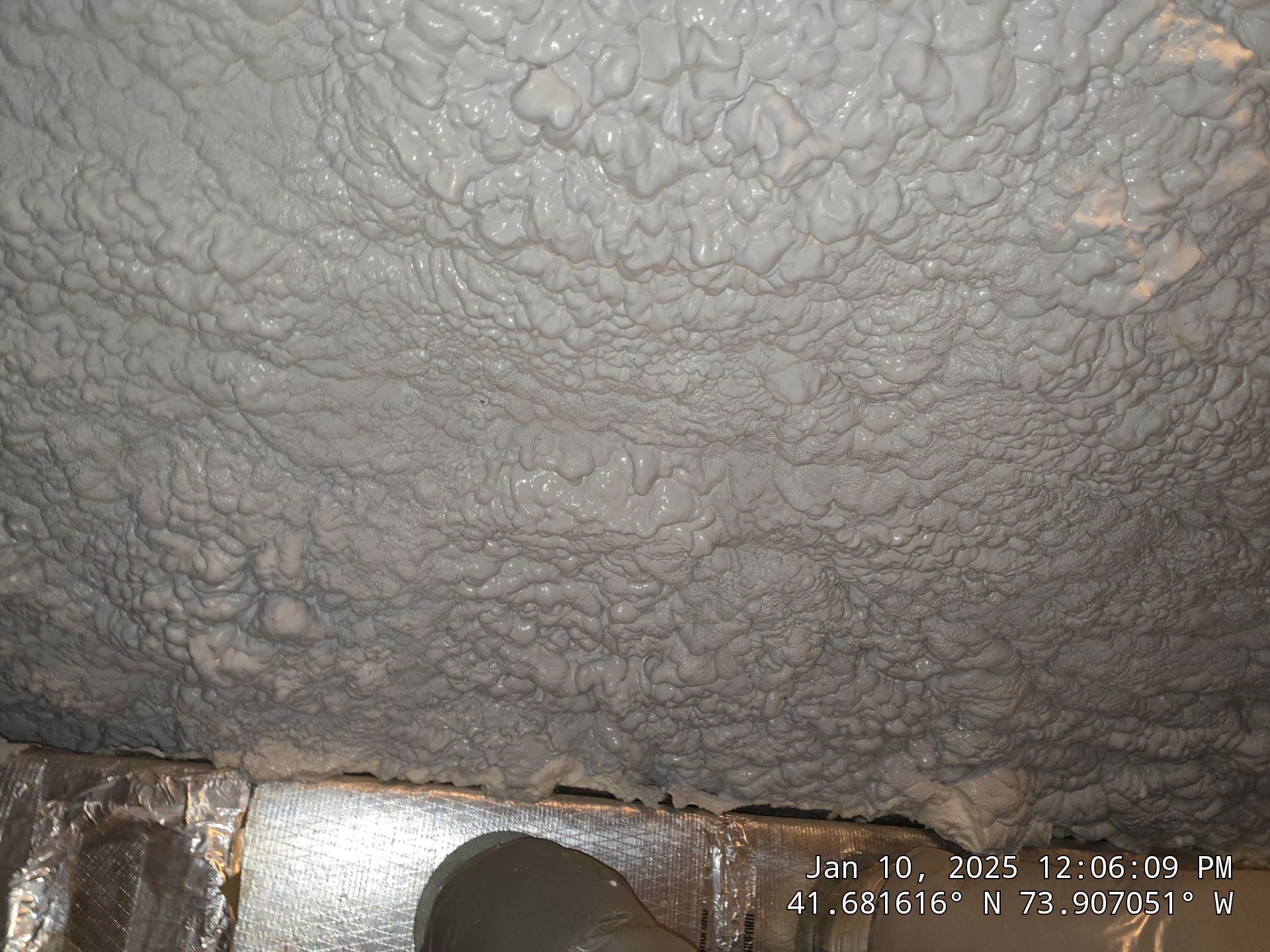 Attic Insulation using open cell spray foam by NYS Foam & Energy