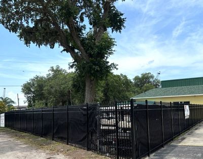 Aluminum Fence Installation using Black 3 Rail Aluminum Fence