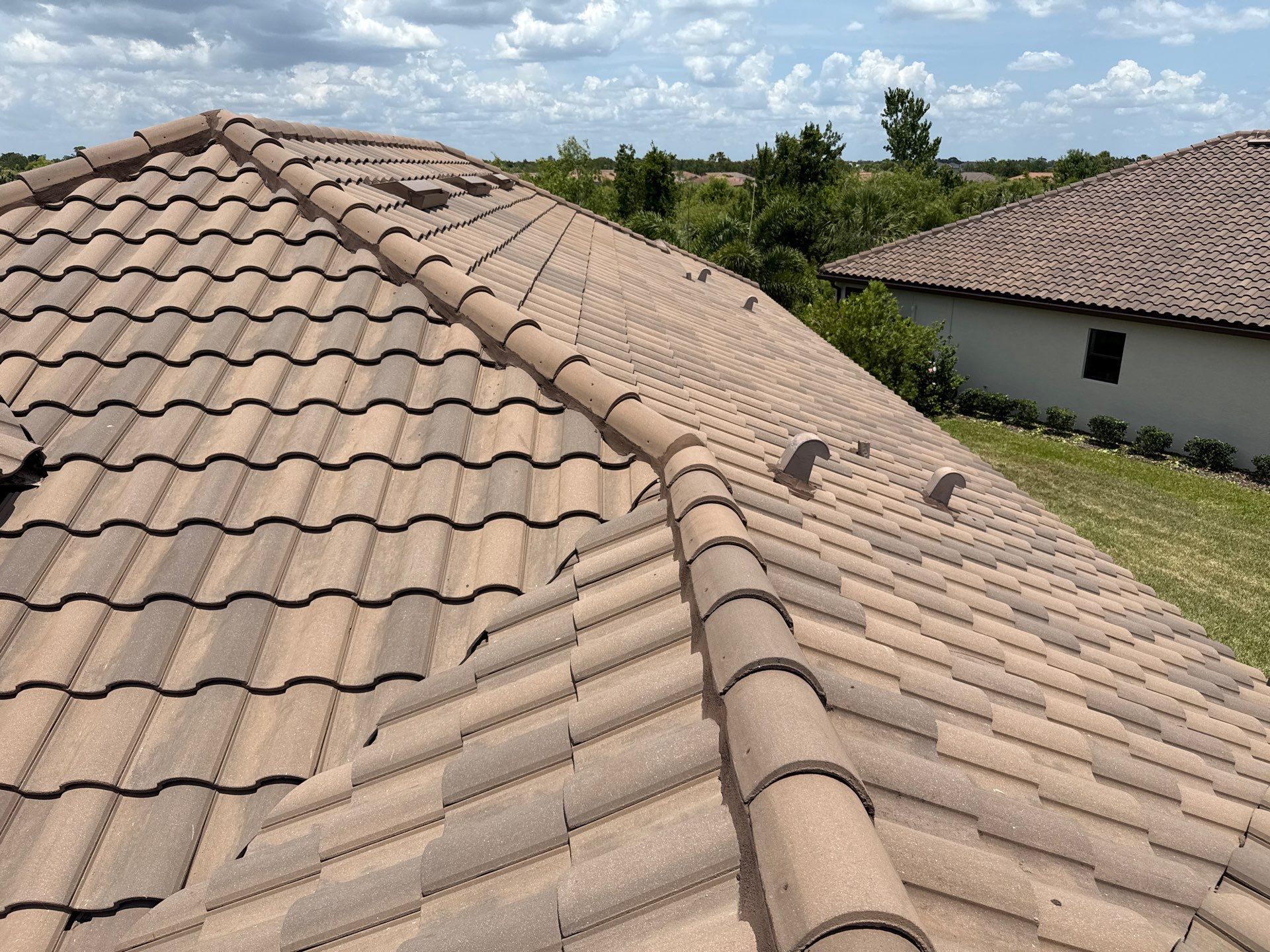 Concrete Tile Roof, Paver Driveway & Lanai Cleaning – Artisan Lakes Esplanade, Palmetto, FL by Sunshine AquaWash