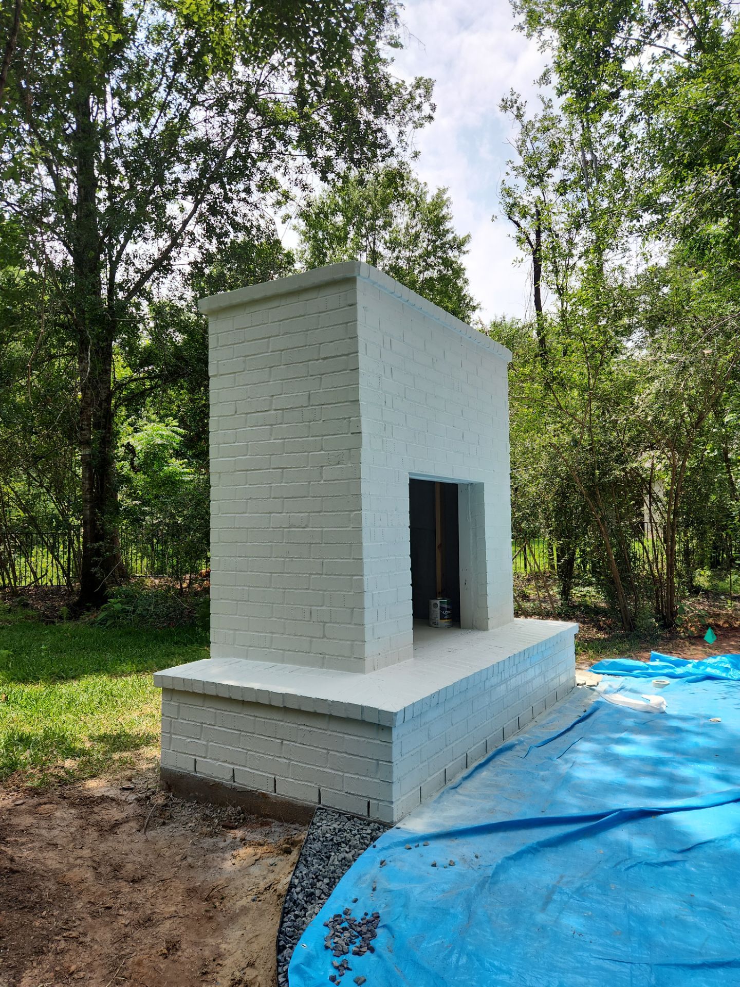 Outdoor Fireplace in Tomball, TX by SophAlx LLC