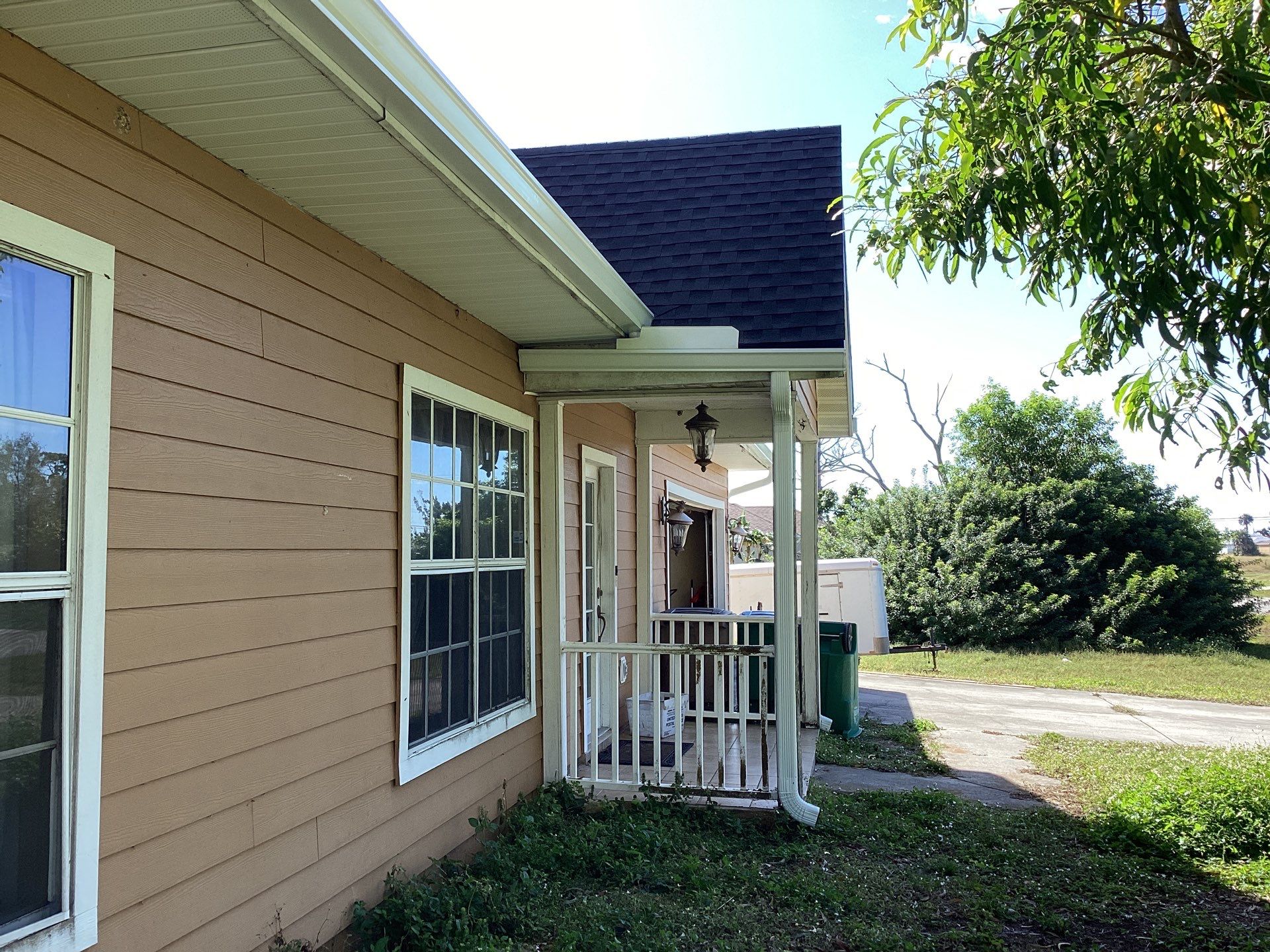 Soffit & Fascia White + New Downspouts by Gutter Professors