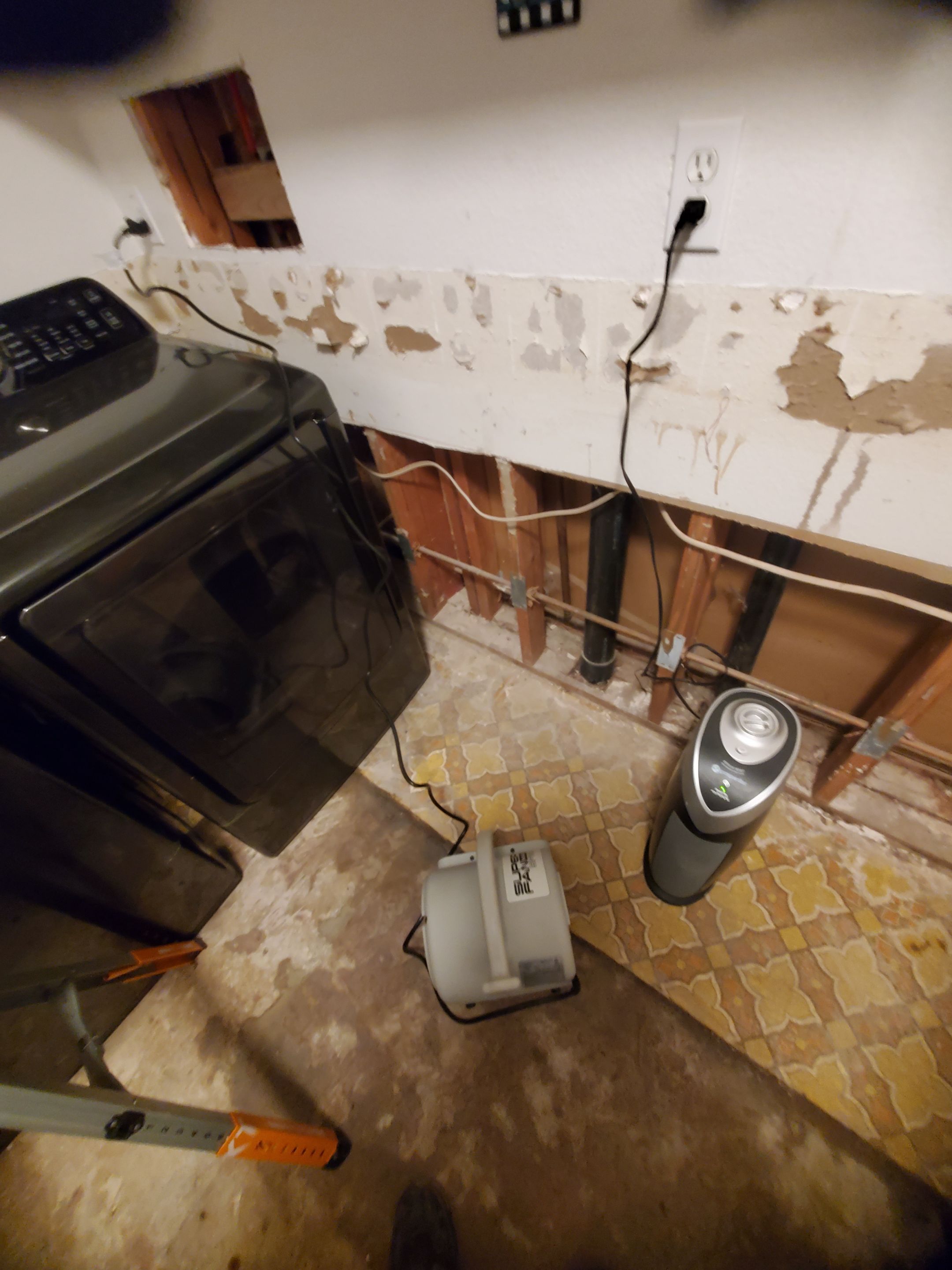 Water Damage using Air Movers by Construction Now LLC