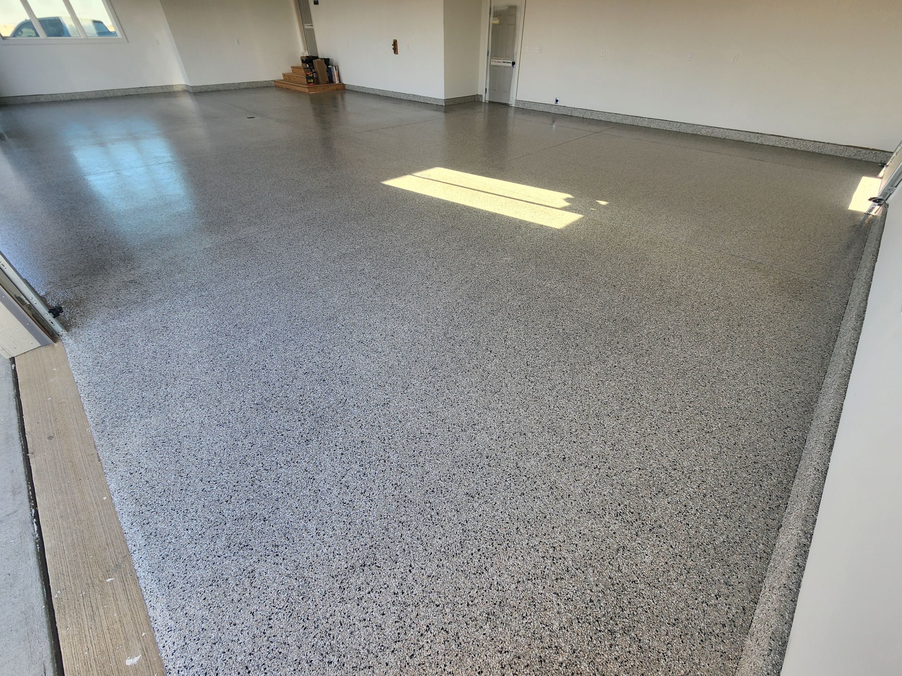 Garage using Domino by Select Painting, Coatings & Garage Cabinets