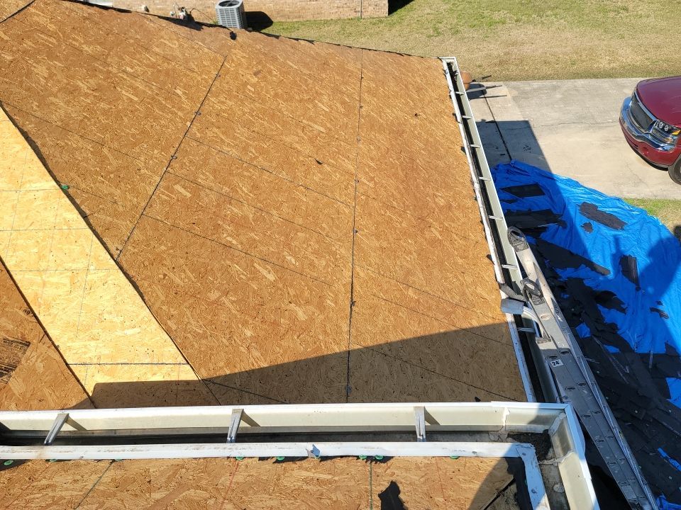 Residential Roofing Installation using Roof Replacement by American Roofing & Construction LLC