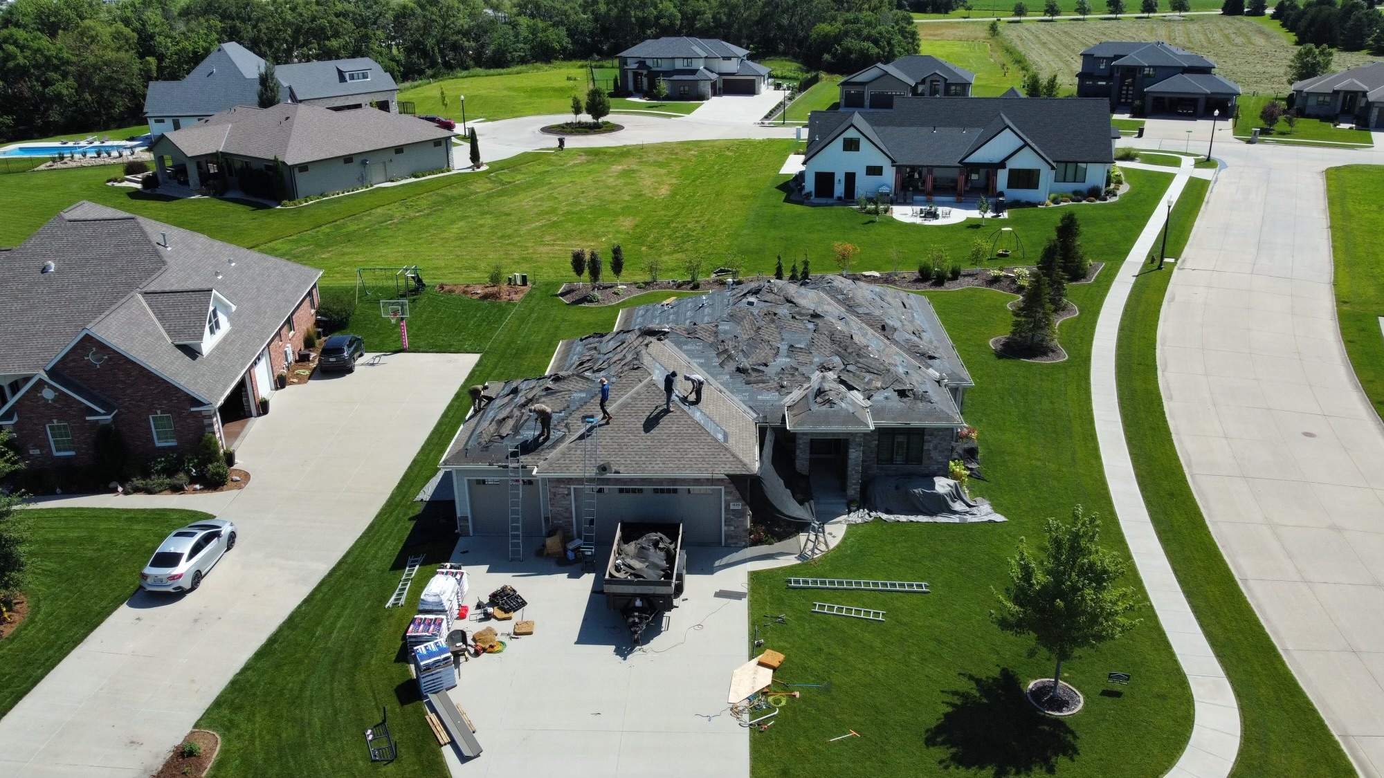 Residential Roofing Installation using TAMKO TITAN WEATHERED WOOD by Lightning Exteriors