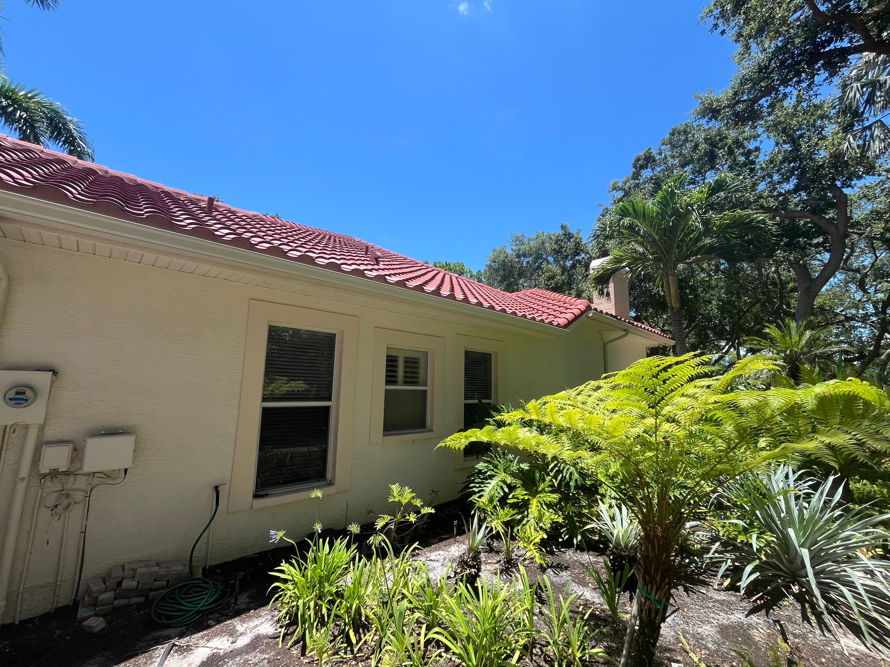 Splash Guard Gutters for Rainy Season Protection in Osprey FL by Gutter Professors