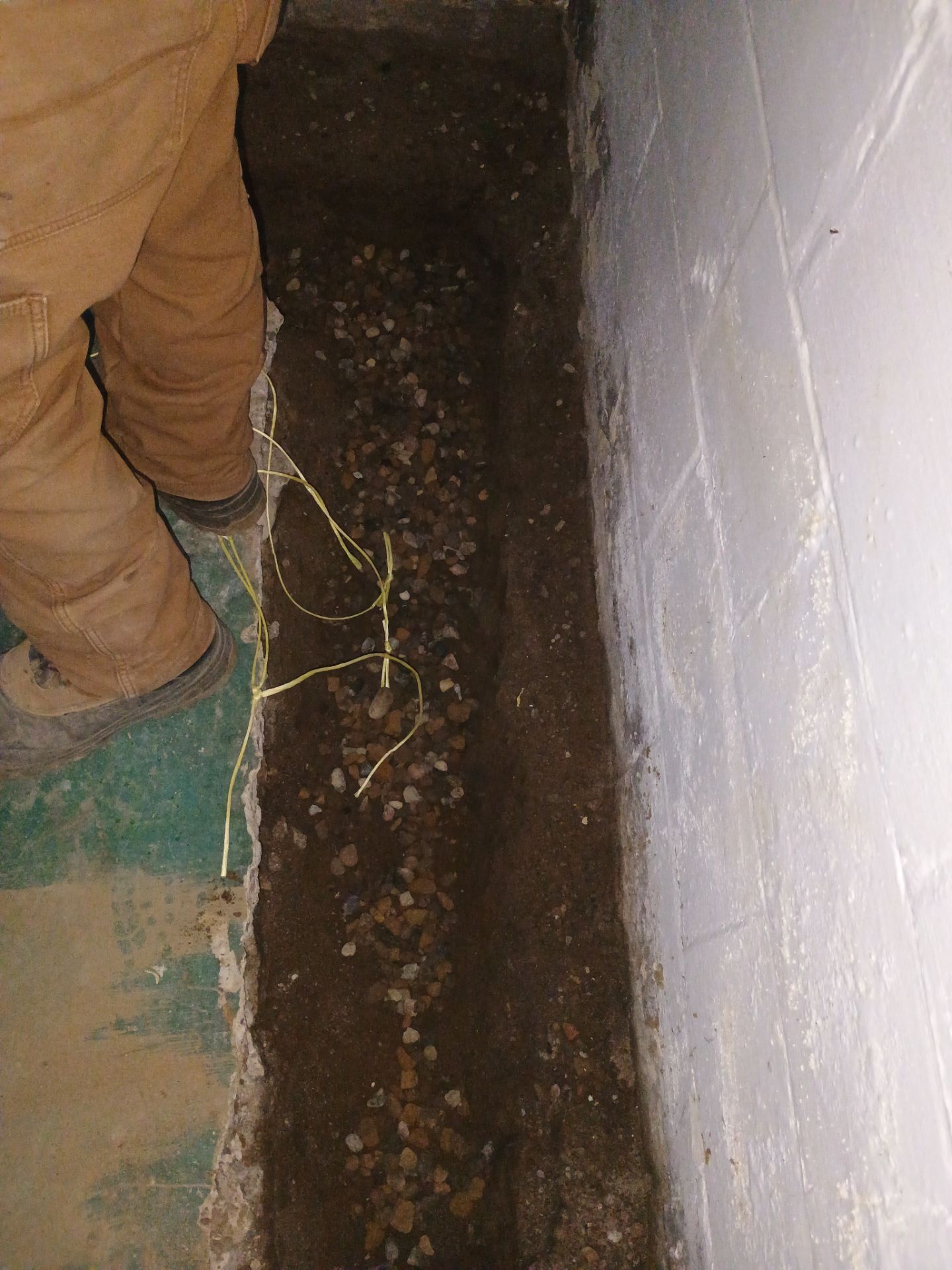 Completing the Connection for Lisa's Drain Tile System by Waterproofing Northeast