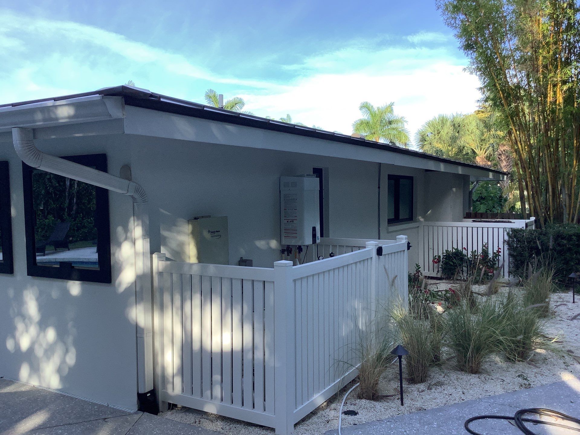 White Seamless Gutters and Downspouts in Sarasota FL by Gutter Professors
