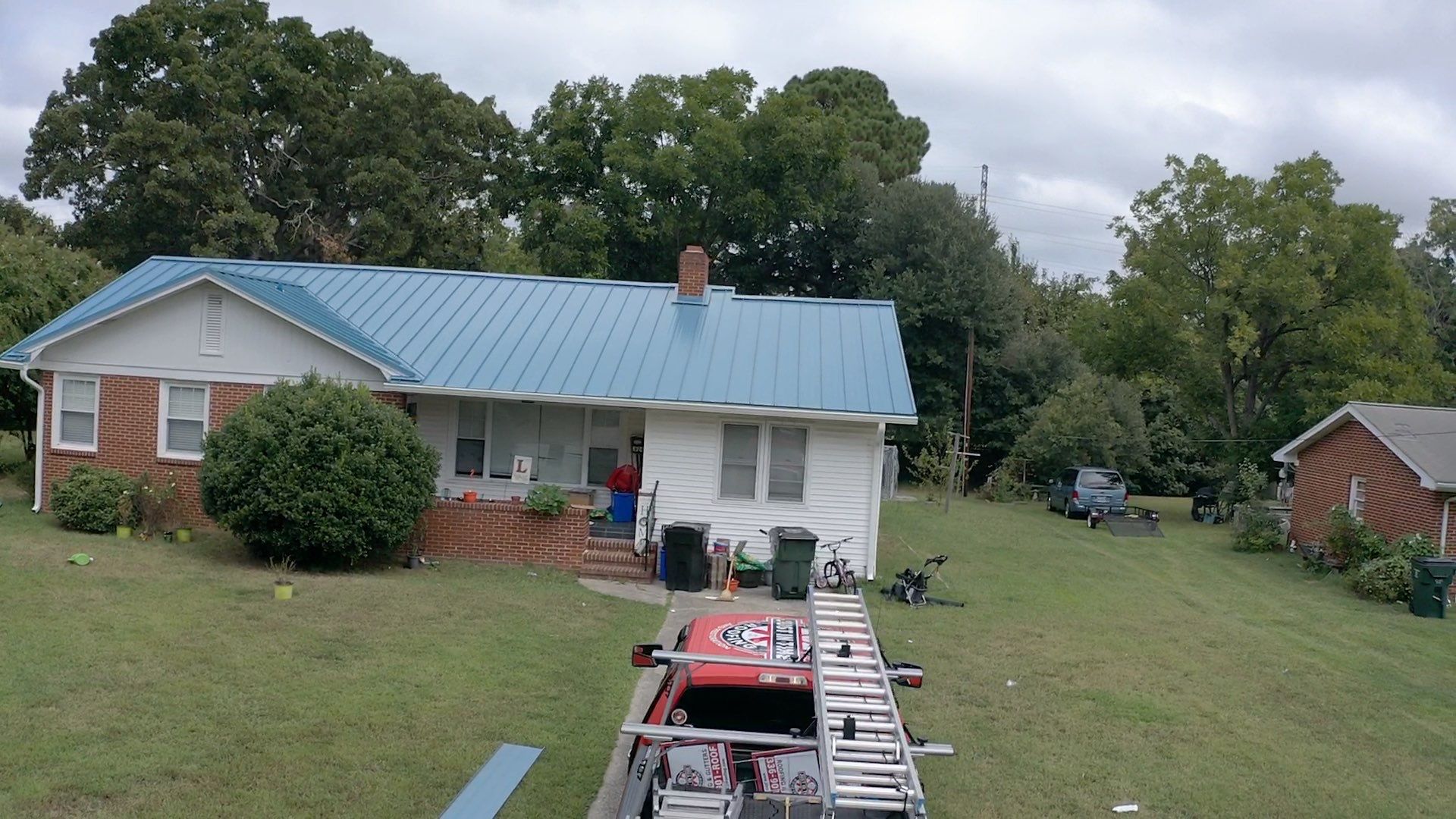 Carolina Blue Standing Seam Roof by Just In Time Roofing and Restoration