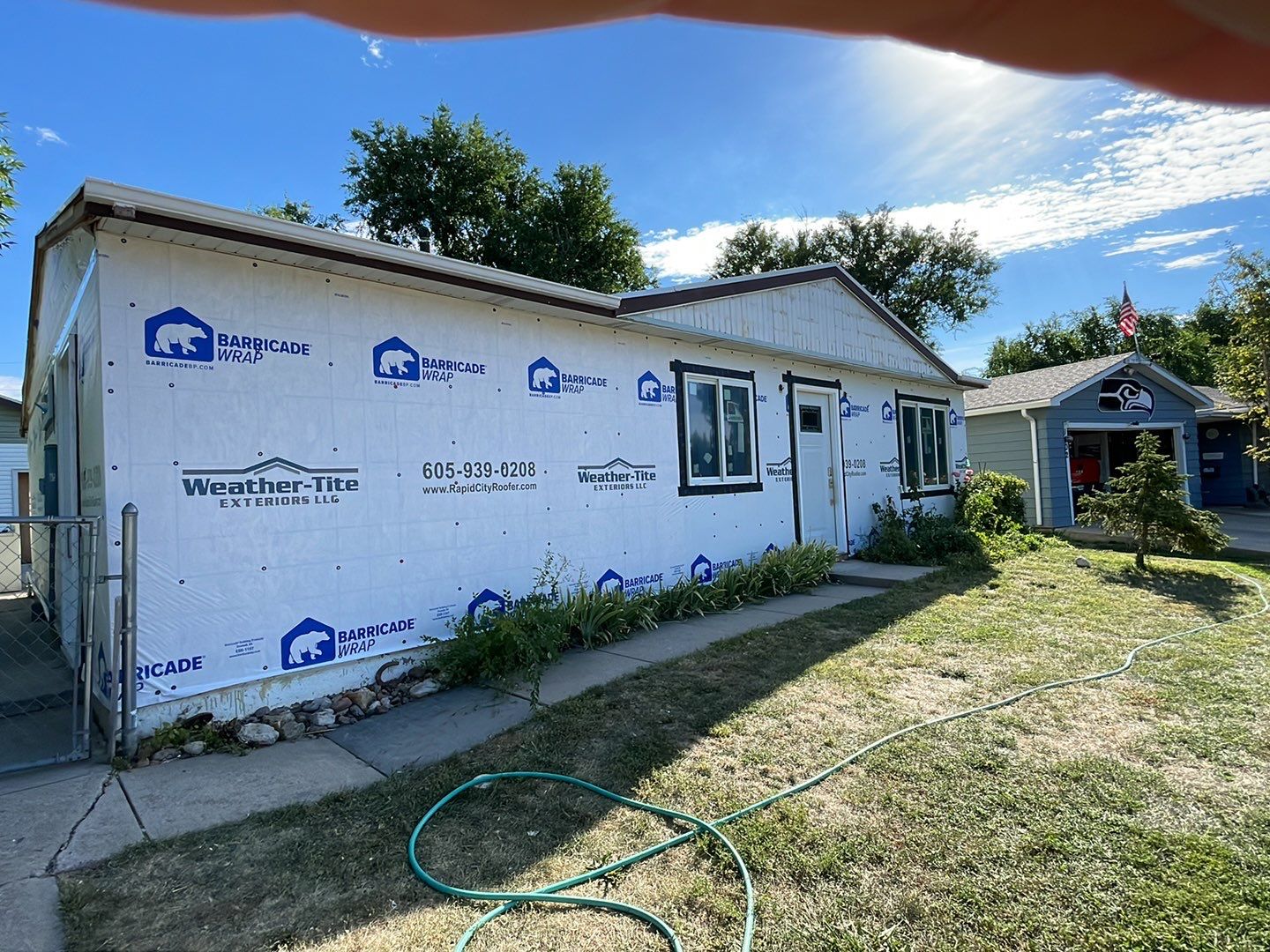 A little bit goes a long way. by Weather-Tite Exteriors LLC