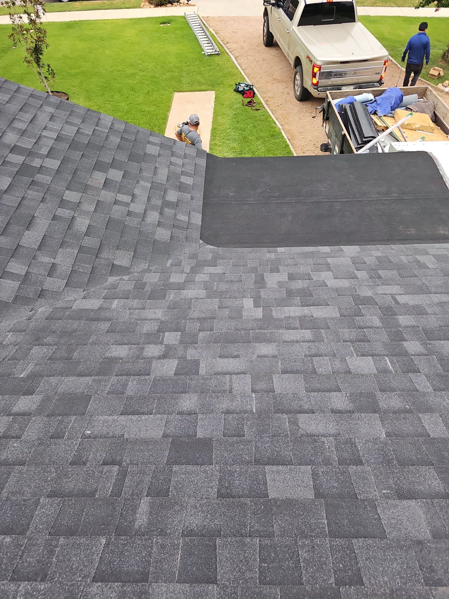 Residential Roofing Installation using Owens Corning Oakridge Onyx Black by DeZign Roofing & Exteriors