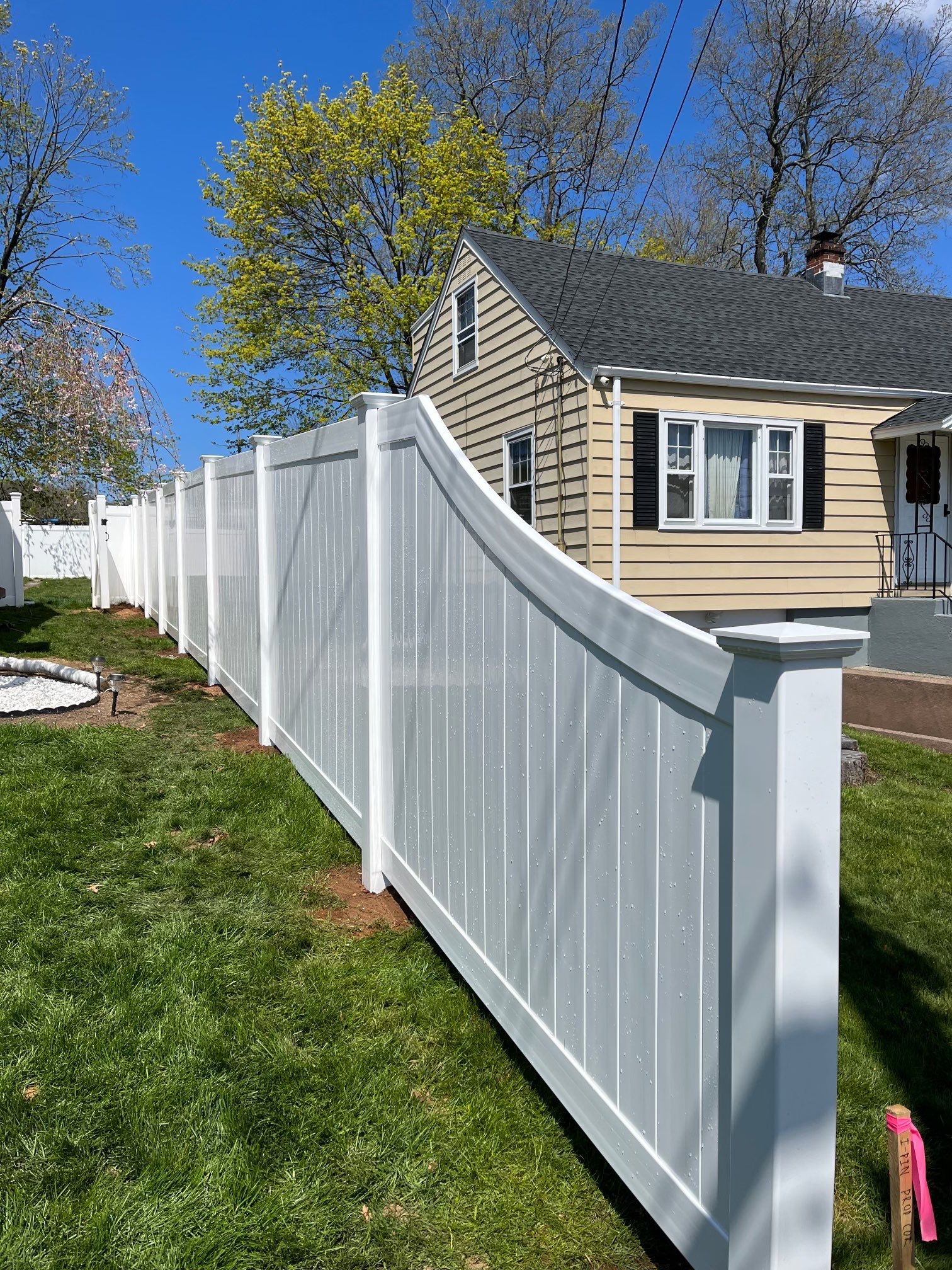 New 6' Tall Vinyl Privacy Fence, with Transition.  by DiGiorgi Roofing and Siding Inc