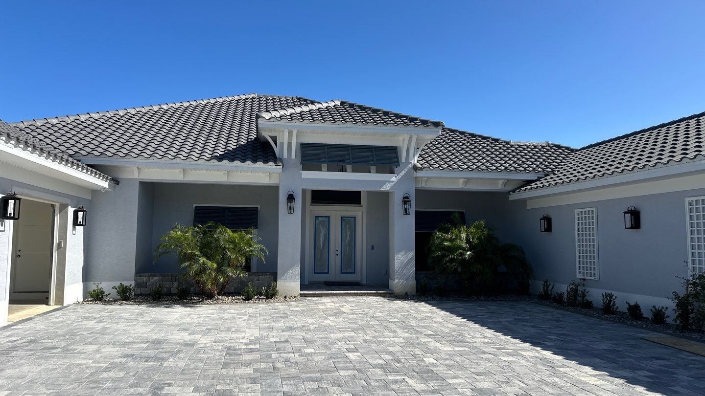 Bahama Shutters in Blue Grey by Smart Guard Shutters