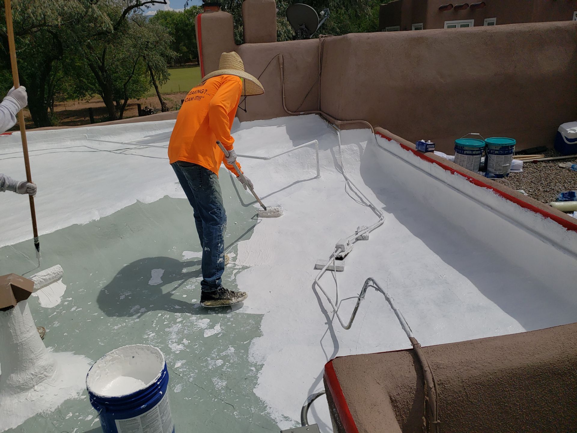 Residential roof application by SPF Services 