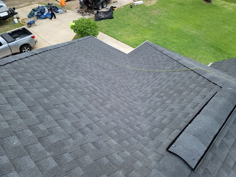 Residential Roofing Installation using Roof Replacement by American Roofing & Construction LLC
