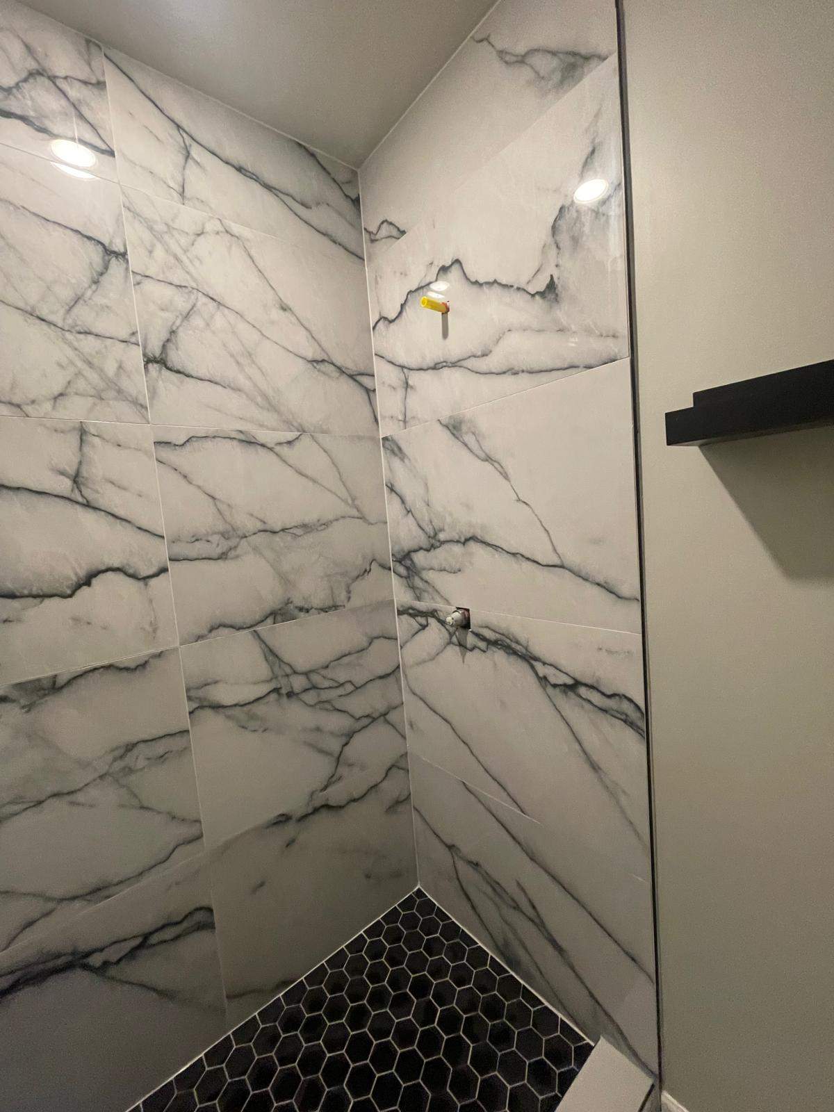 Tub to walk-in shower conversion by Prudencio