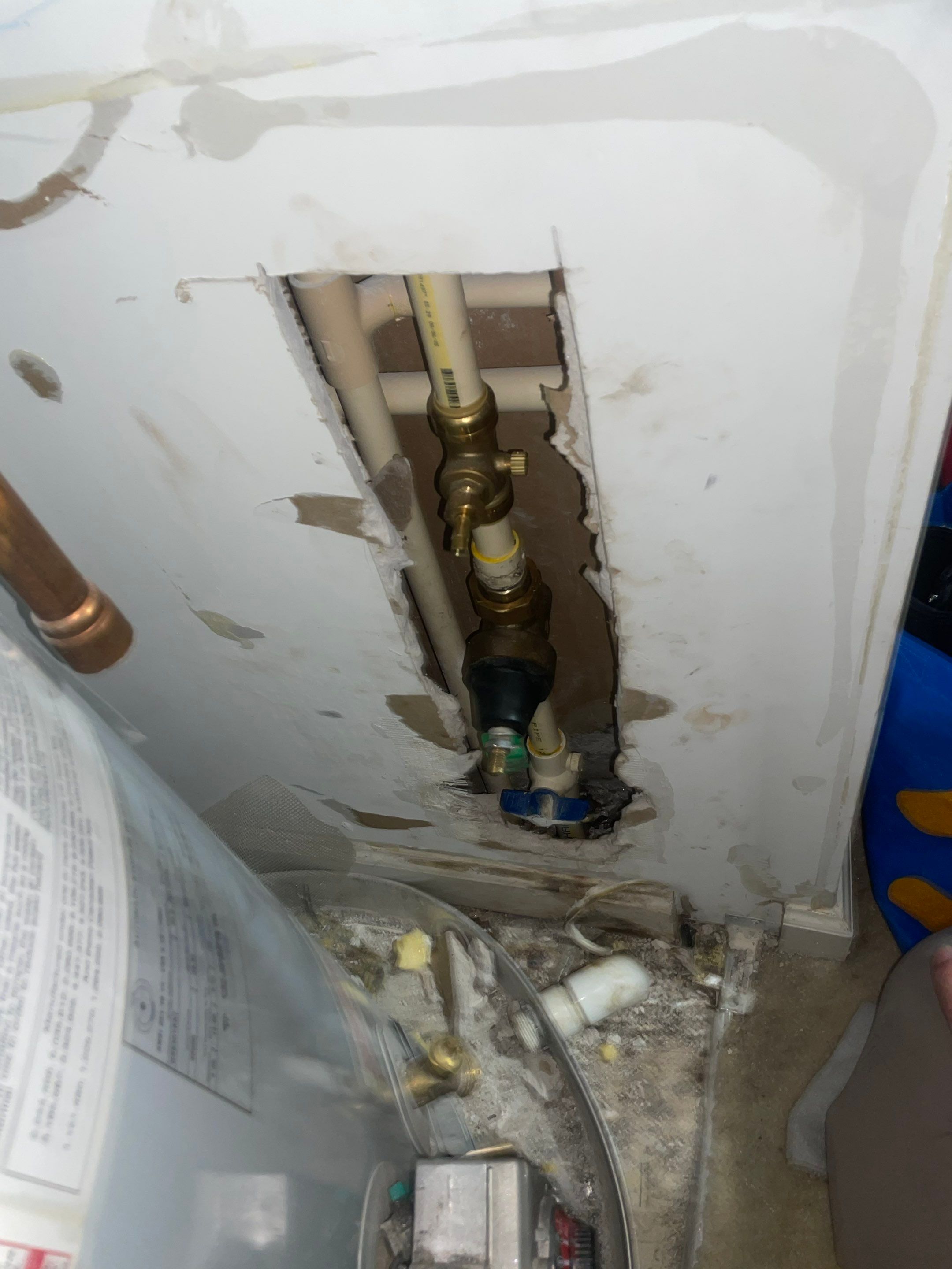 Leak pot water heater by Restoration services