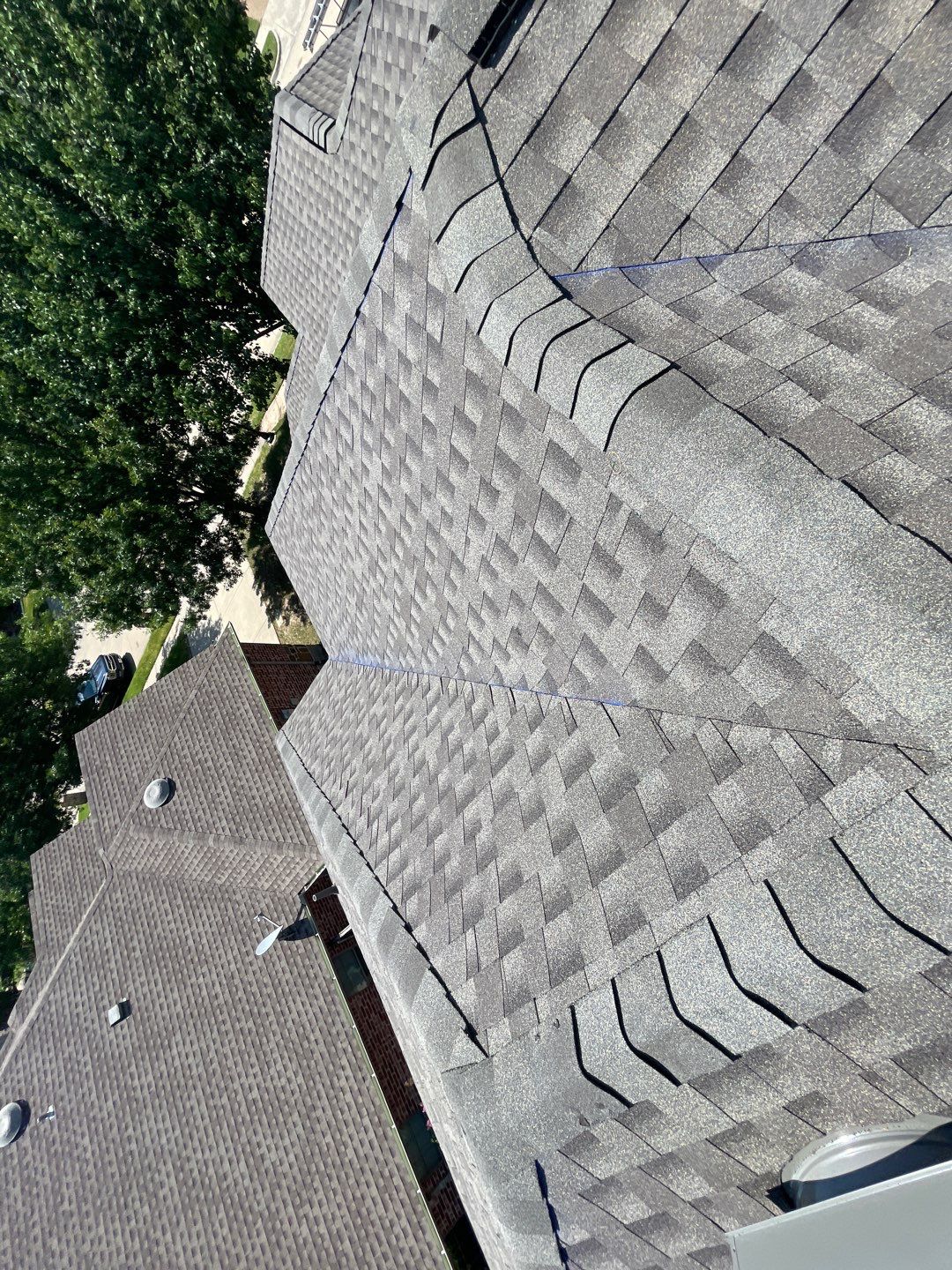 Major Hail Storm Full Roof and Gutter Replacement by First United Roofing & Construction