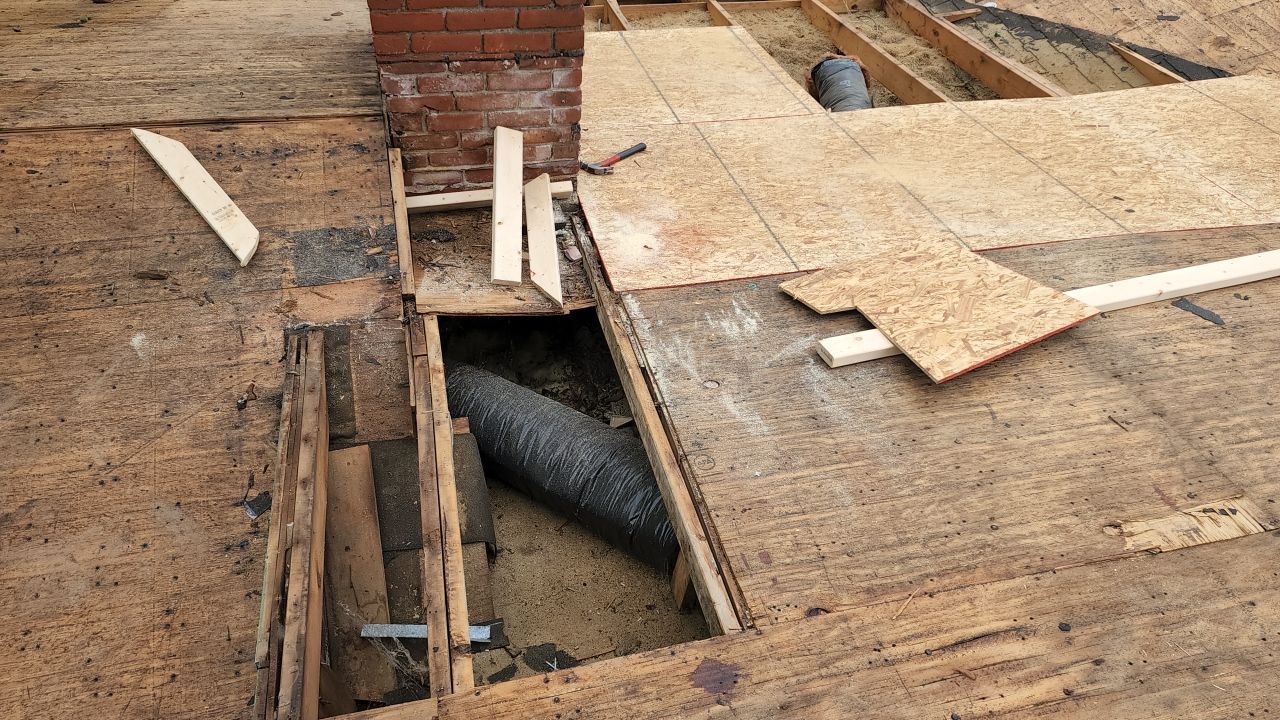 Residential Roofing Installation using 60 mil rubber roof  by Nitro Roofing and Construction