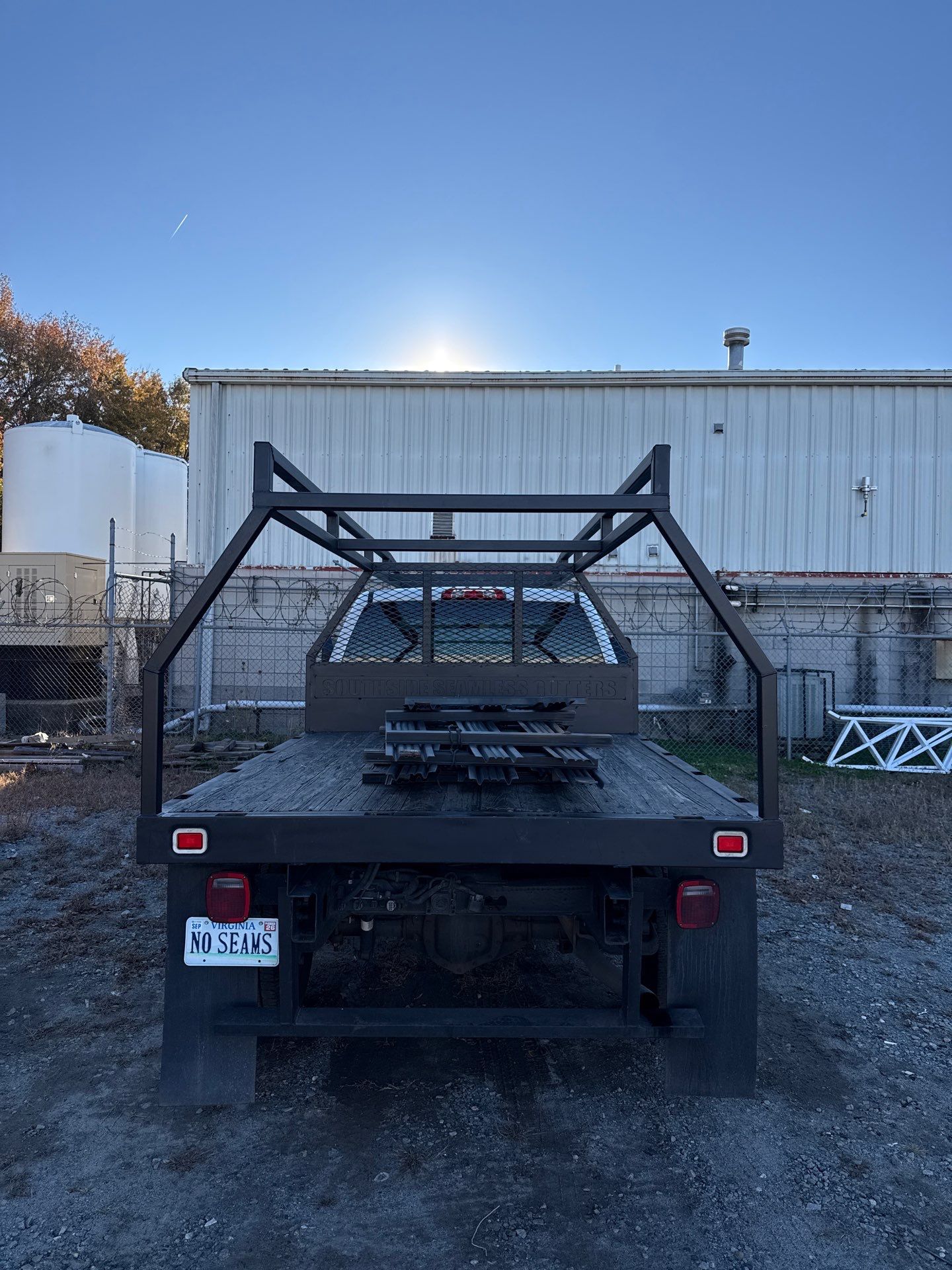 Seamless Gutters Ladder Rack by Gregory Sandstrom