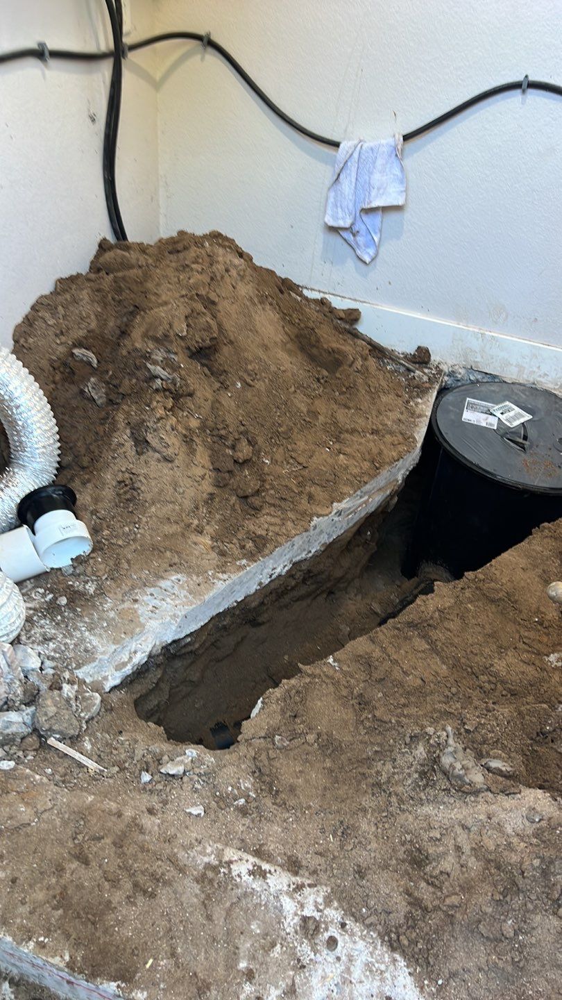 Basement Sump pump/pit by Plumbing Connect Systems LLC