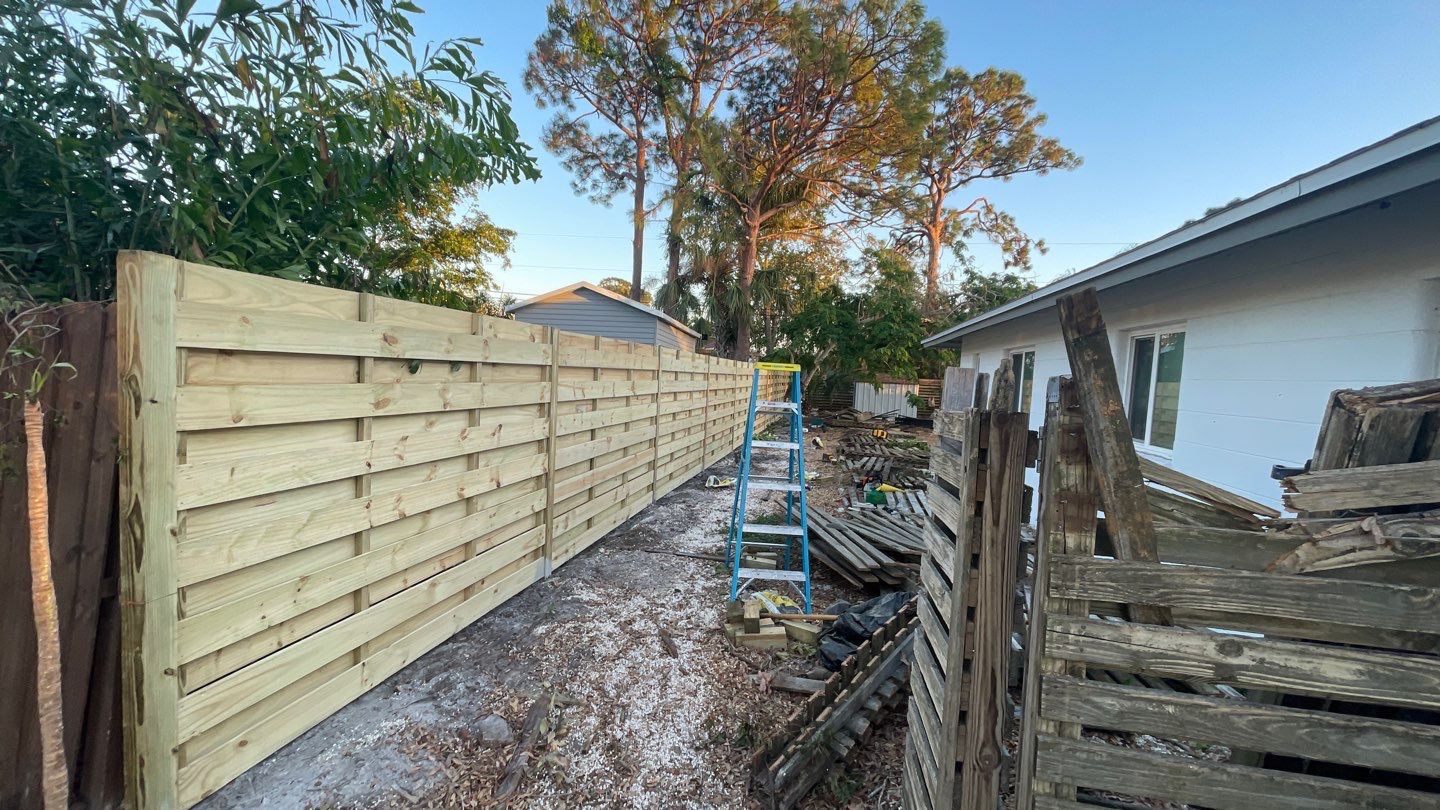 Wood Fence Installation using Horizontal Shadowbox Wood Privacy Fence by Asap fence and gates, LLC