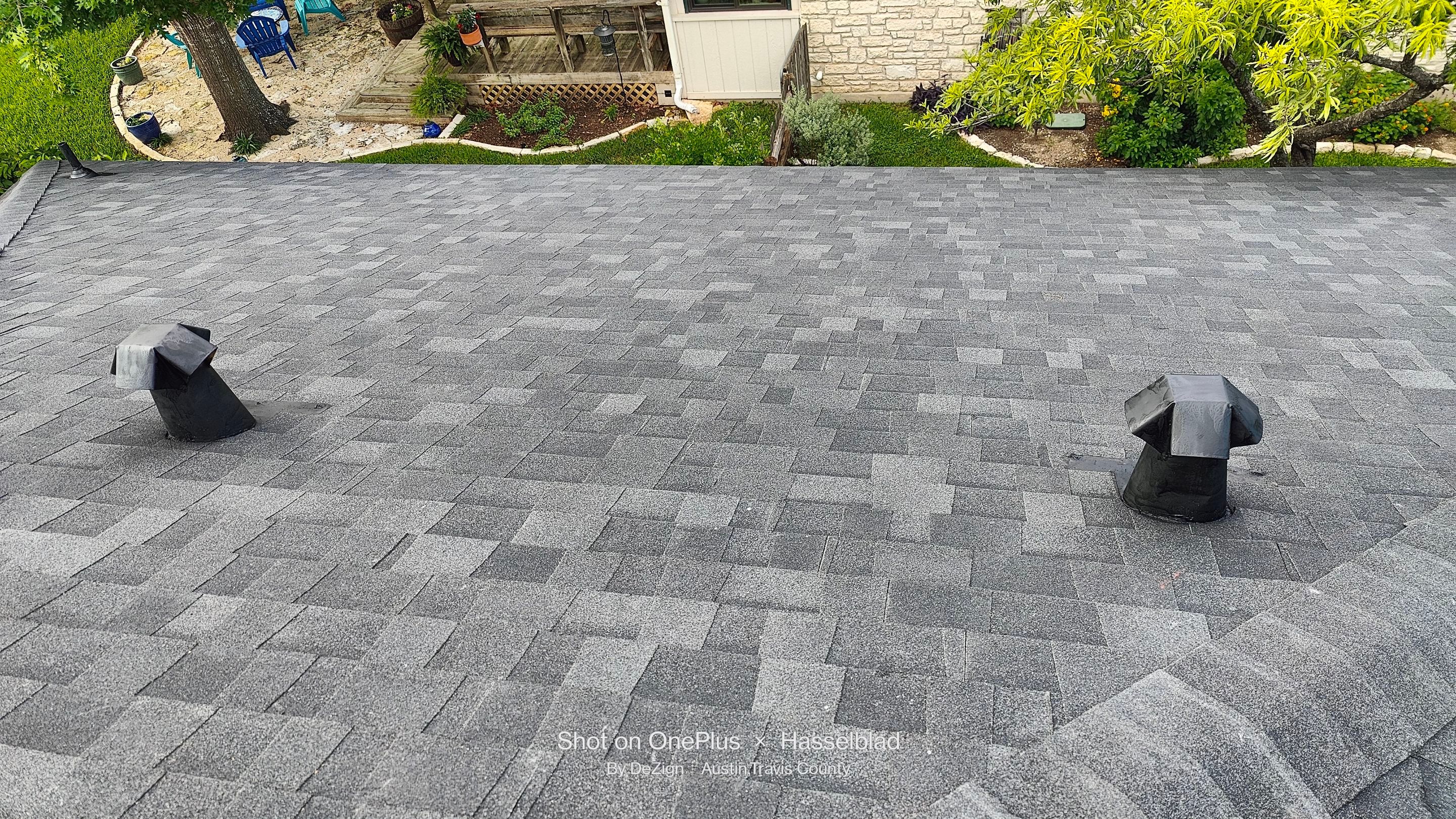 Residential Roofing Installation using Owens Corning Oakridge Onyx Black by DeZign Roofing & Exteriors