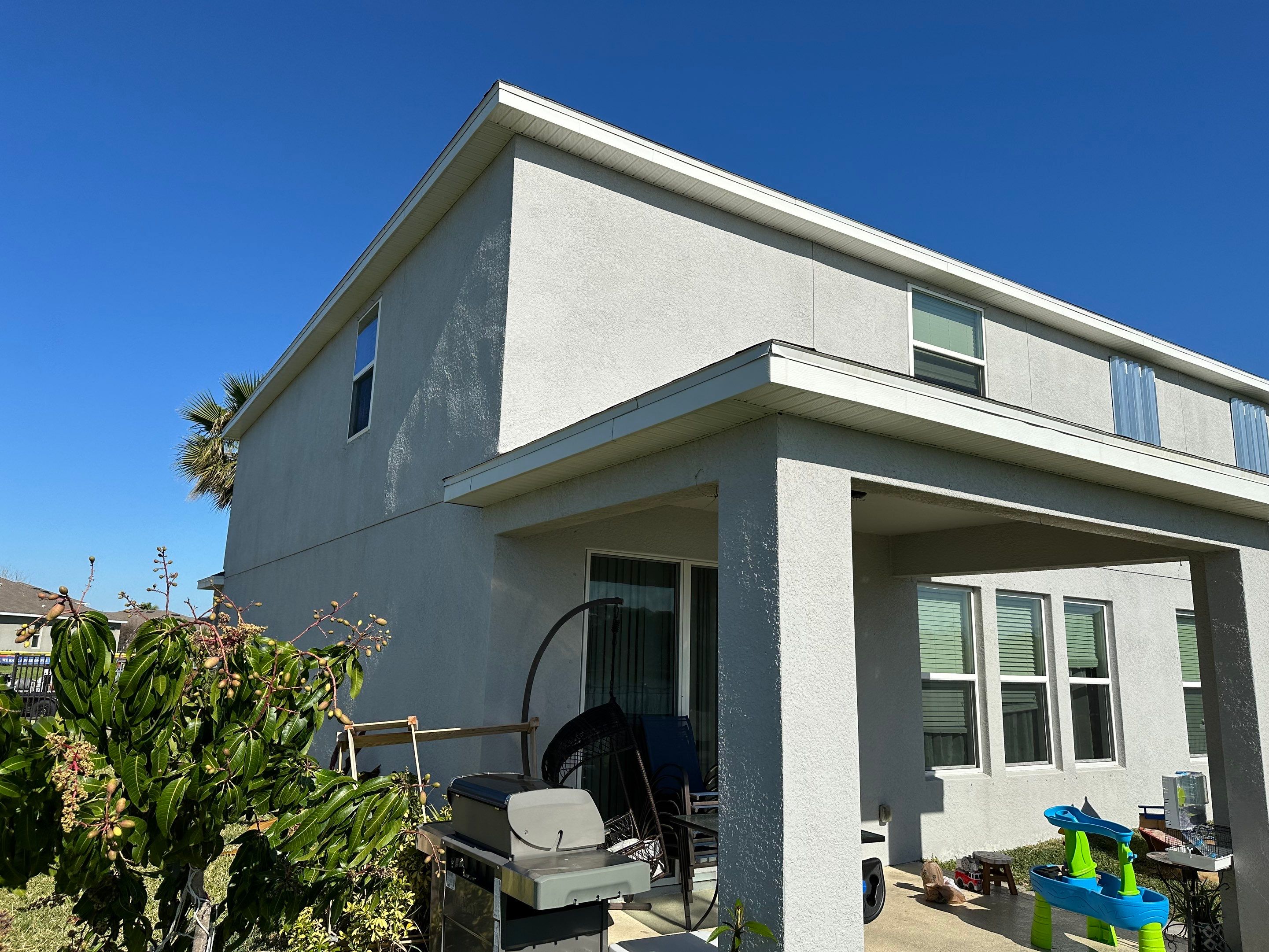 2-Story House Wash & Paver Driveway Cleaning in Trevesta Community, Palmetto, FL | Sunshine AquaWash by Sunshine AquaWash