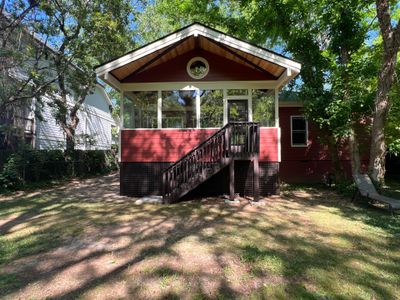 Elevated Screened-In Porch Addition with Vaulted Tongue-and-Groove Ceiling