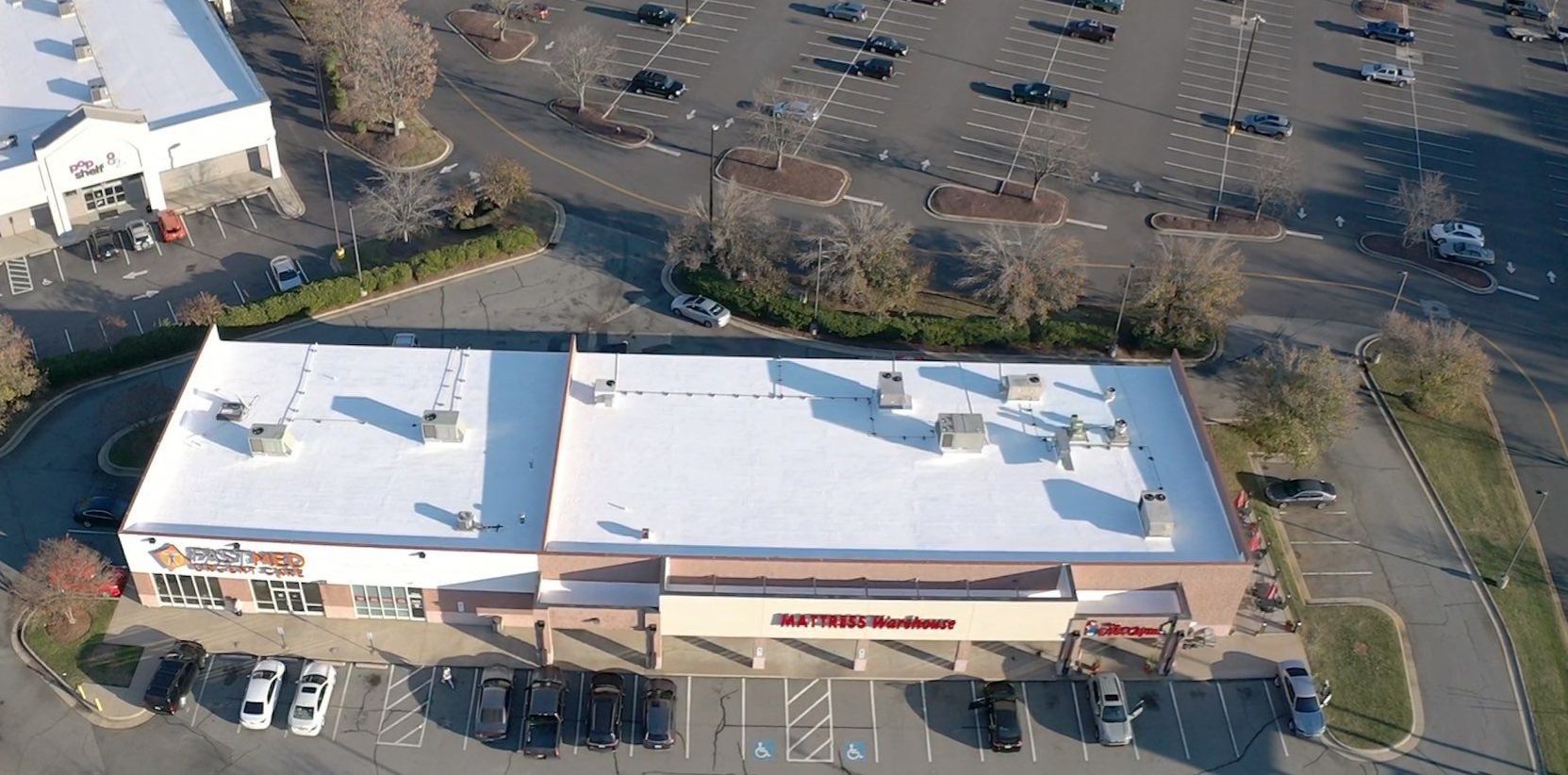 Commercial Coating using Poly Urerthane and Silicone Coating by Just In Time Roofing and Restoration