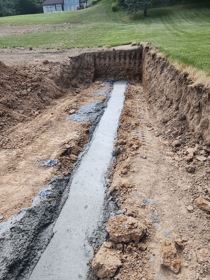 Fence / Retaining Wall using Block then parge by ACE Waterproofing & Basement Solutions