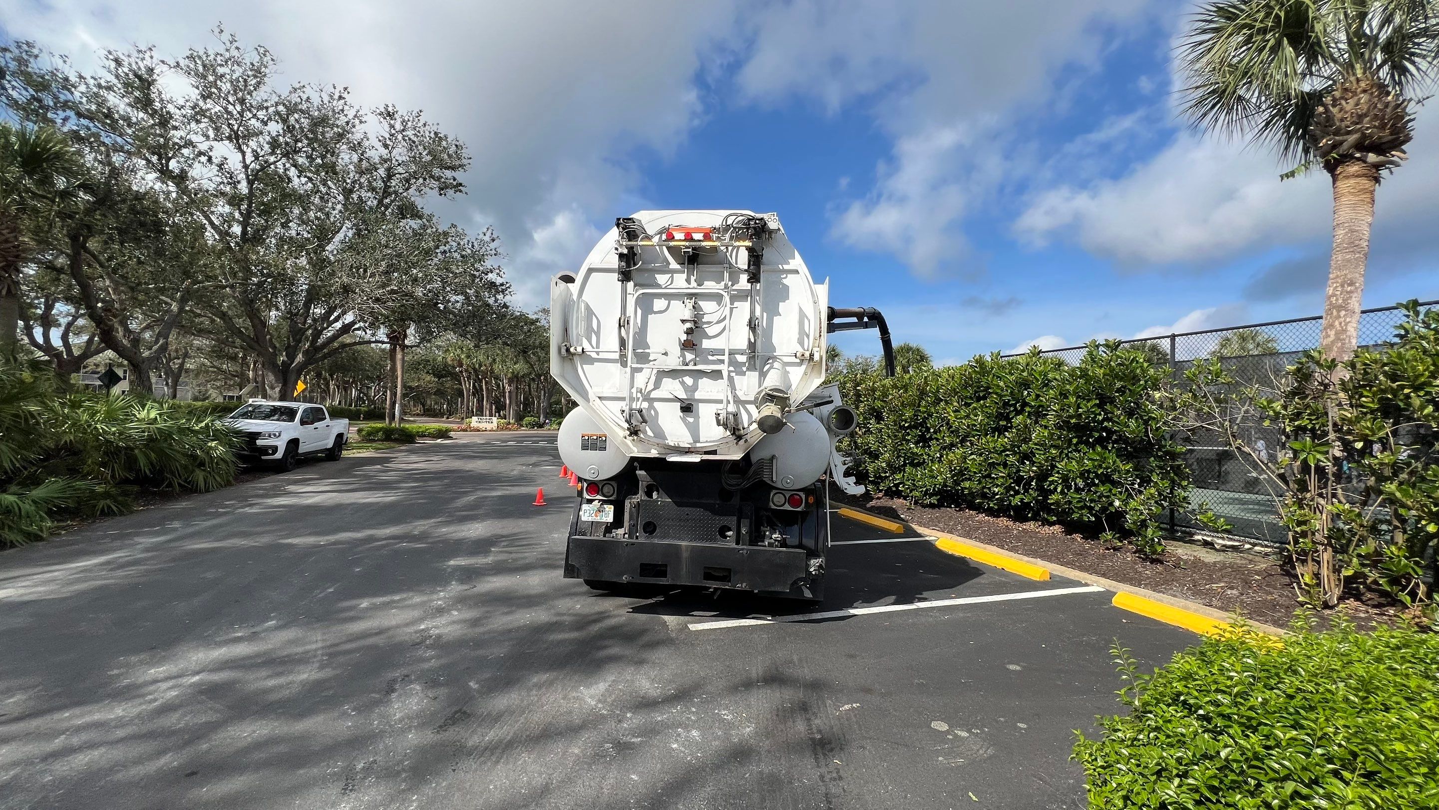 Pelican Landing Tennis Court Catch Basin Cleaning by APS Power & Water