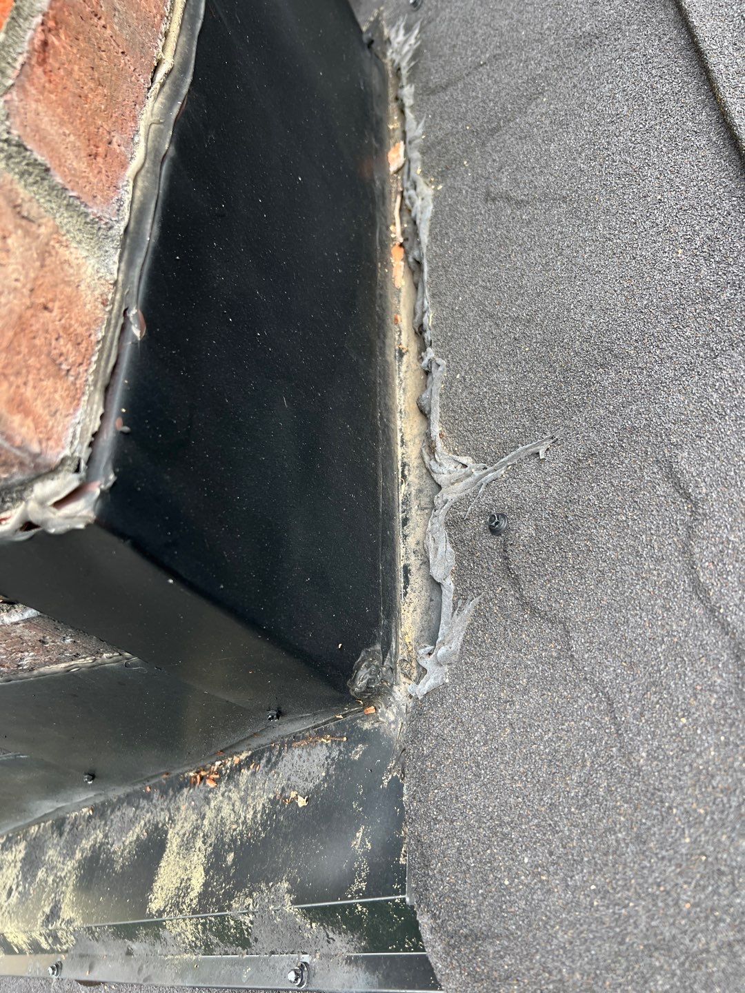 Residential Roofing Repair using Chimney counter flashing by Nitro Roofing and Construction