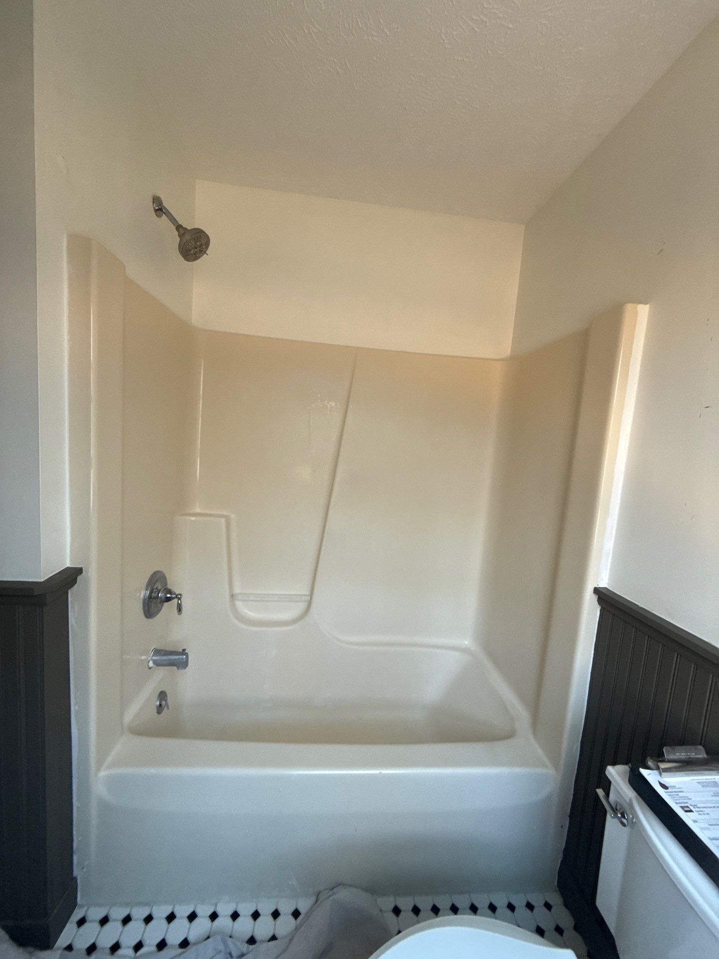 Subway Tile Shower Conversion and Bathroom Update in Traverse City by Rainbow Seamless Systems