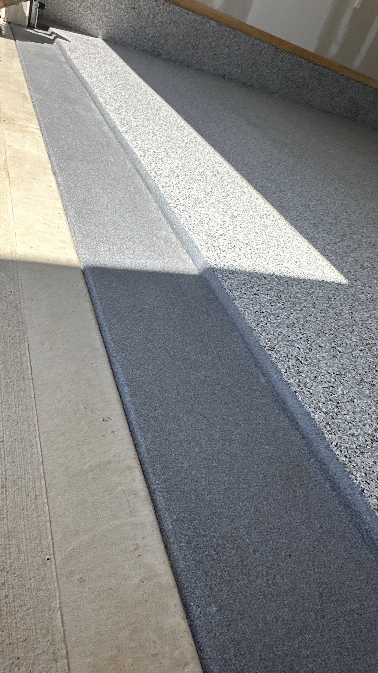 Phil B. new floor with Coyote flake by Banner Garage